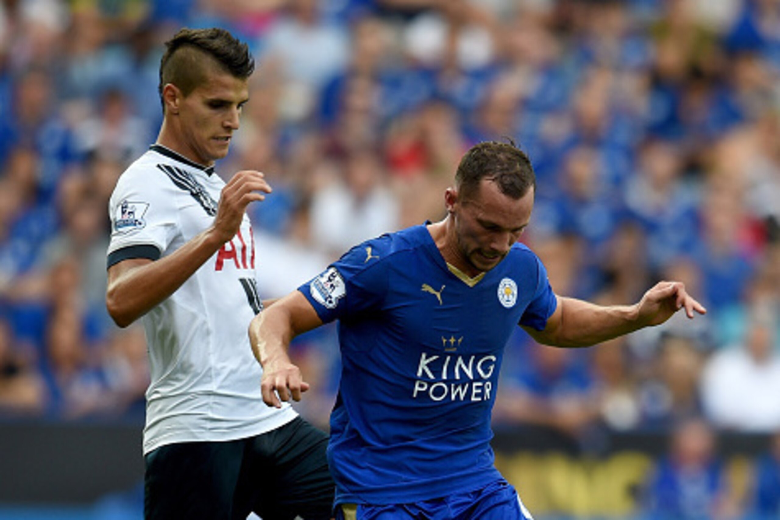 LEICESTER, ENGLAND - AUGUST 22:  Erik Lamela of Tottenham is challenged by Danny Drinkwater of Leicester during the Barclays Premier League match between Leicester City and Tottenham Hotspur at the King Power Stadium on August 22, 2015 in Leicester, Unite