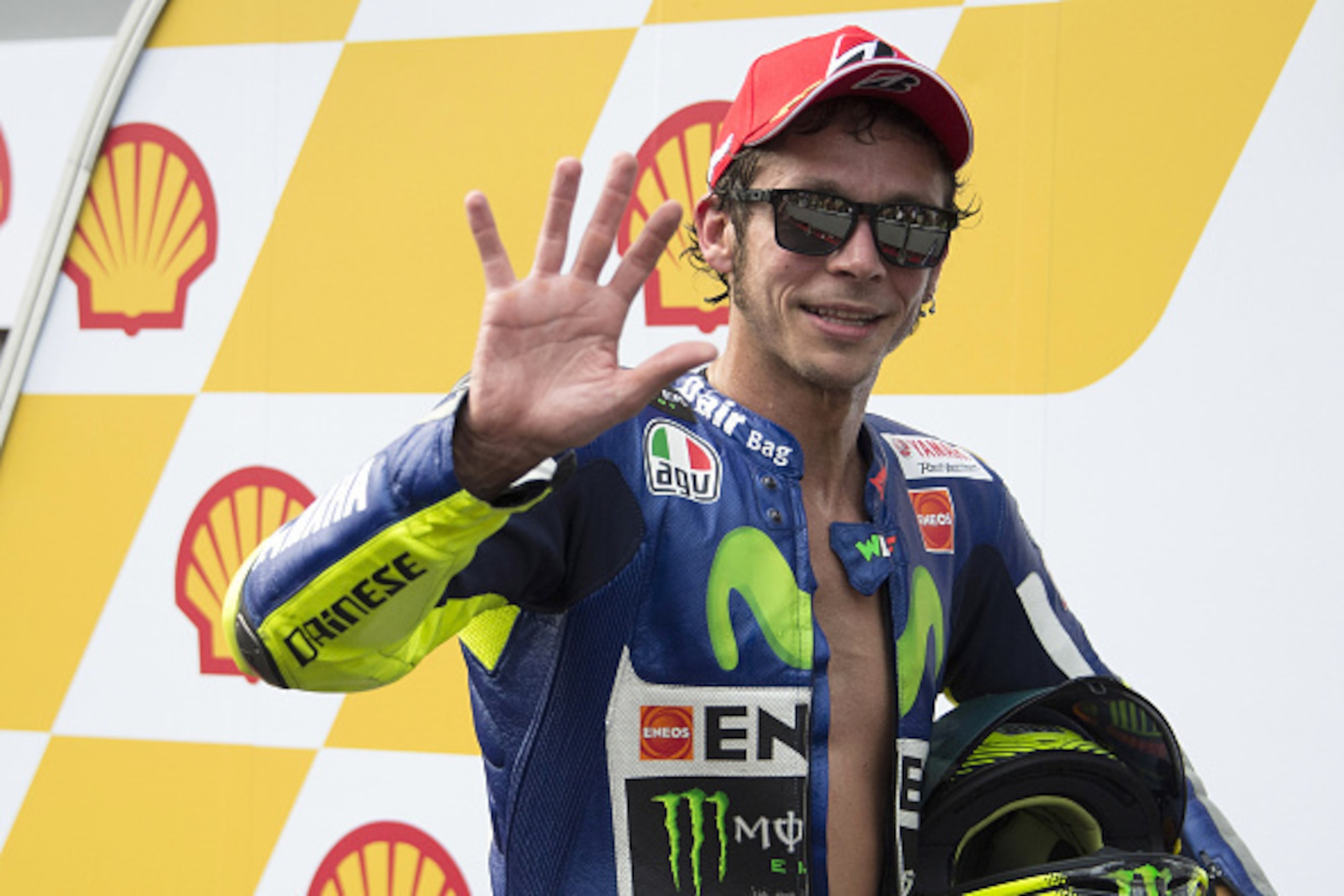 KUALA LUMPUR, MALAYSIA - OCTOBER 25:  Valentino Rossi of Italy and Movistar Yamaha MotoGP celebrates the third place at the end of the MotoGP race during the MotoGP Of Malaysia at Sepang Circuit on October 25, 2015 in Kuala Lumpur, Malaysia.  (Photo by Mi