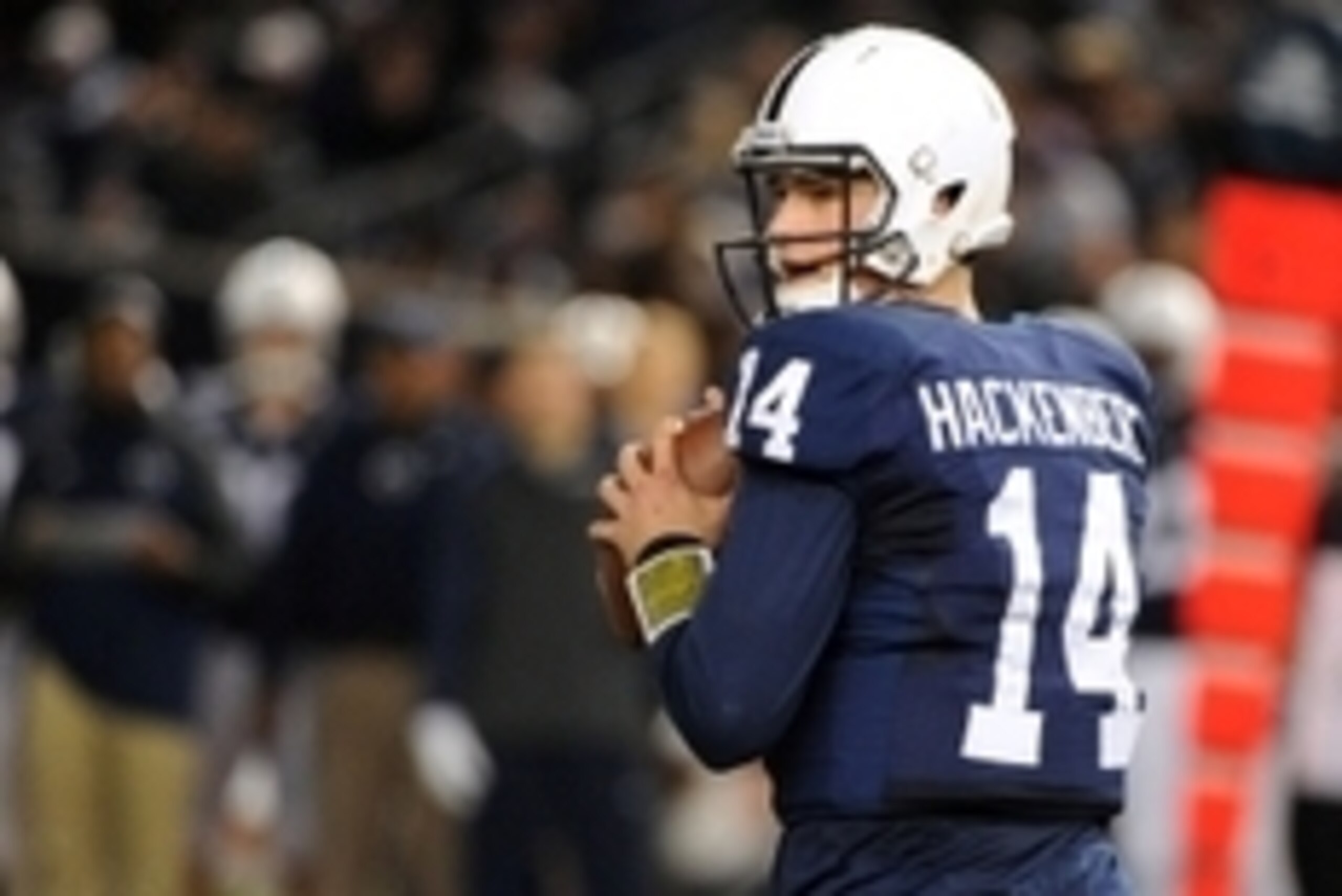 Dec 27, 2014; Bronx, NY, USA; Penn State Nittany Lions quarterback Christian Hackenberg (14) drops back to pass against the Boston College Eagles during the first quarter in the 2014 Pinstripe Bowl at Yankee Stadium.  Mandatory Credit: Rich Barnes-USA TOD