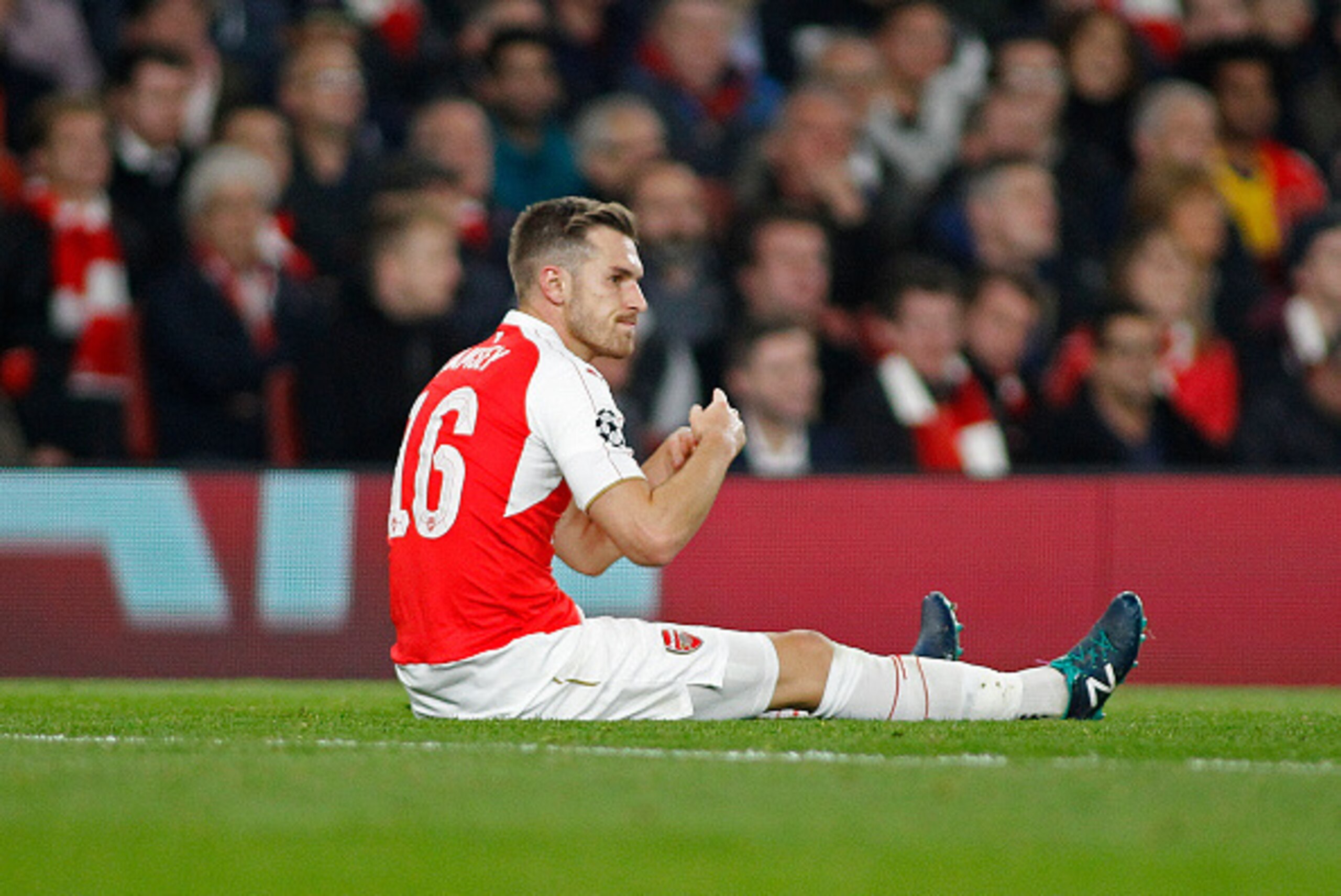 LONDON, ENGLAND - OCTOBER 20: Aaron Ramsey of Arsenal signals to the bench that he needs to be substituted during the UEFA Champions League match between Arsenal and Bayern Munich at The Emirates Stadium on October 20, 2015 in London, United Kingdom. (Pho LONDON, ENGLAND - OCTOBER 20: Aaron Ramsey of Arsenal signals to the bench that he needs to be substituted during the UEFA Champions League match between Arsenal and Bayern Munich at The Emirates Stadium on October 20, 2015 in London, United Kingdom. (Pho