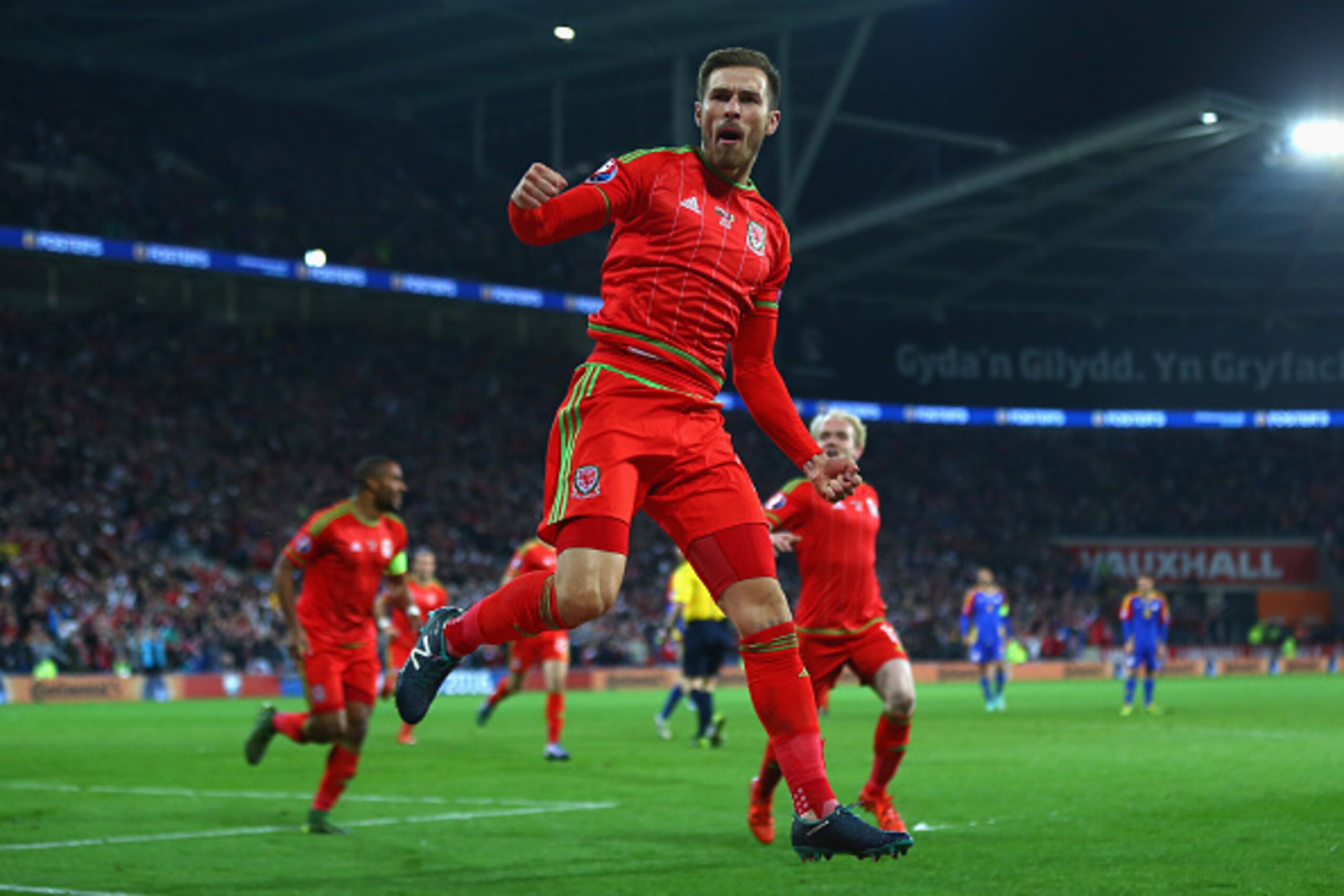 CARDIFF, WALES - OCTOBER 13: Aaron Ramsey of Wales celebrates scoring the opening goal during the UEFA EURO 2016 Qualifier match at the Cardiff City Stadium on October 13, 2015 in Cardiff, United Kingdom. (Photo by Michael Steele/Getty Images) CARDIFF, WALES - OCTOBER 13: Aaron Ramsey of Wales celebrates scoring the opening goal during the UEFA EURO 2016 Qualifier match at the Cardiff City Stadium on October 13, 2015 in Cardiff, United Kingdom. (Photo by Michael Steele/Getty Images)