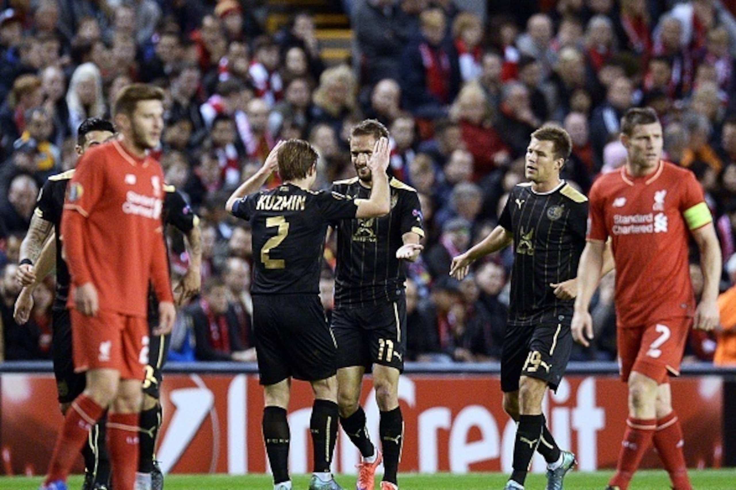 Rubin Kazan's Ukrainian striker Marko Devic (C)  celebrates after scoring the first goal  during a UEFA Europa League group B football match between Liverpool FC and FC Rubin Kazan at Anfield in Liverpool, north west England, on October 22, 2015.  AFP PHO