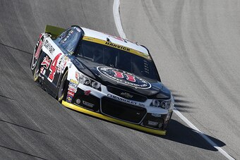 JOLIET, IL - SEPTEMBER 19:  Kevin Harvick, driver of the #4 Jimmy John's / Budweiser Chevrolet, practices for the NASCAR Sprint Cup Series MyAFibRisk.com 400 at Chicagoland Speedway on September 19, 2015 in Joliet, Illinois.  (Photo by Matt Sullivan/Getty