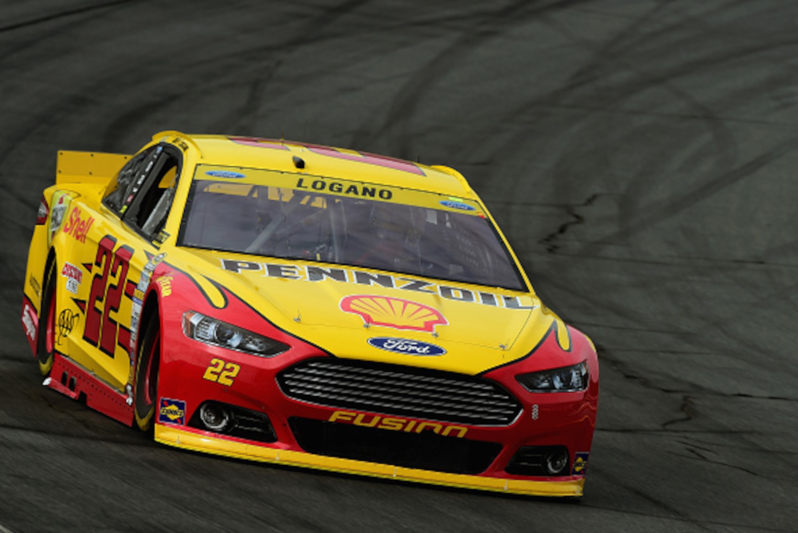 LOUDON, NH - SEPTEMBER 25:  Joey Logano, driver of the #22 Shell Pennzoil Ford, practices for the NASCAR Sprint Cup Series Sylvania 300 at New Hampshire Motor Speedway on September 25, 2015 in Loudon, New Hampshire.  (Photo by Jared C. Tilton/Getty Images
