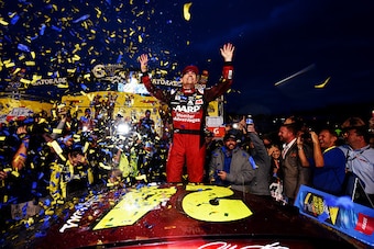 MARTINSVILLE, VA - NOVEMBER 01:  Jeff Gordon, driver of the #24 AARP Member Advantages Chevrolet, celebrates in Victory Lane after winning the NASCAR Sprint Cup Series Goody's Headache Relief Shot 500 at Martinsville Speedway on November 1, 2015 in Martin