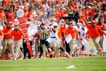 Oct 24, 2015; Miami Gardens, FL, USA; Clemson Tigers quarterback Deshaun Watson (4) runs the ball against the Miami Hurricanes during the first half at Sun Life Stadium. Mandatory Credit: Steve Mitchell-USA TODAY Sports