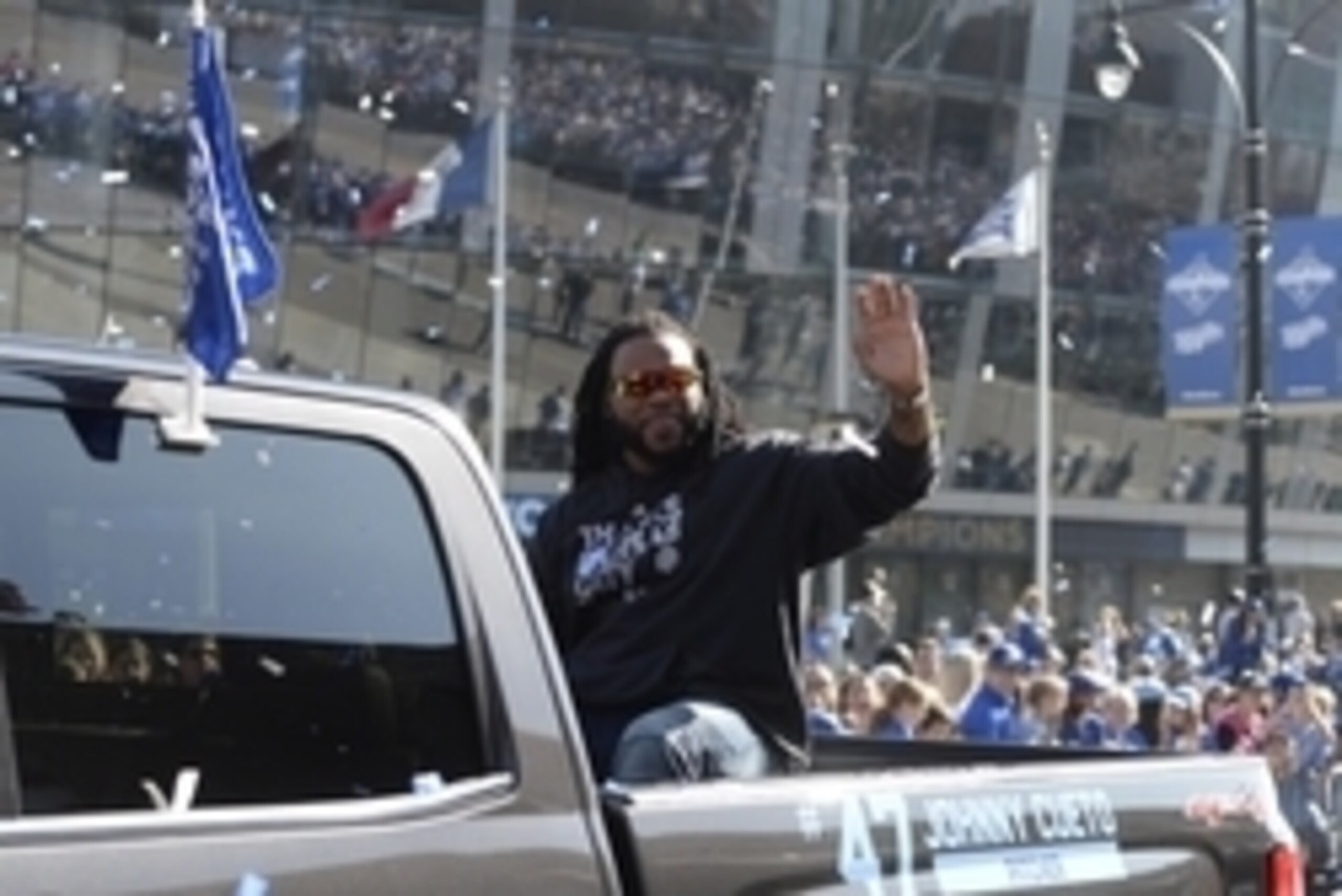 Nov 3, 2015; Kansas City, MO, USA; Kansas City Royals starting pitcher Johnny Cueto (47) waves to the crowd in the World Series parade. Mandatory Credit: John Rieger-USA TODAY Sports