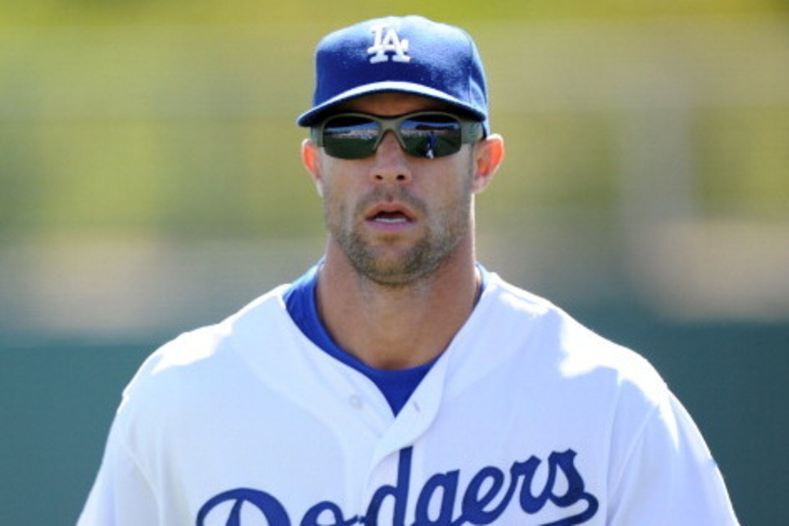PHOENIX, AZ - FEBRUARY 28:  Gabe Kapler #33 of the Los Angeles Dodgers warms up before the game against the Chicago White Sox during spring training at Camelback Ranch on February 28, 2011 in Phoenix, Arizona.  (Photo by Harry How/Getty Images)
