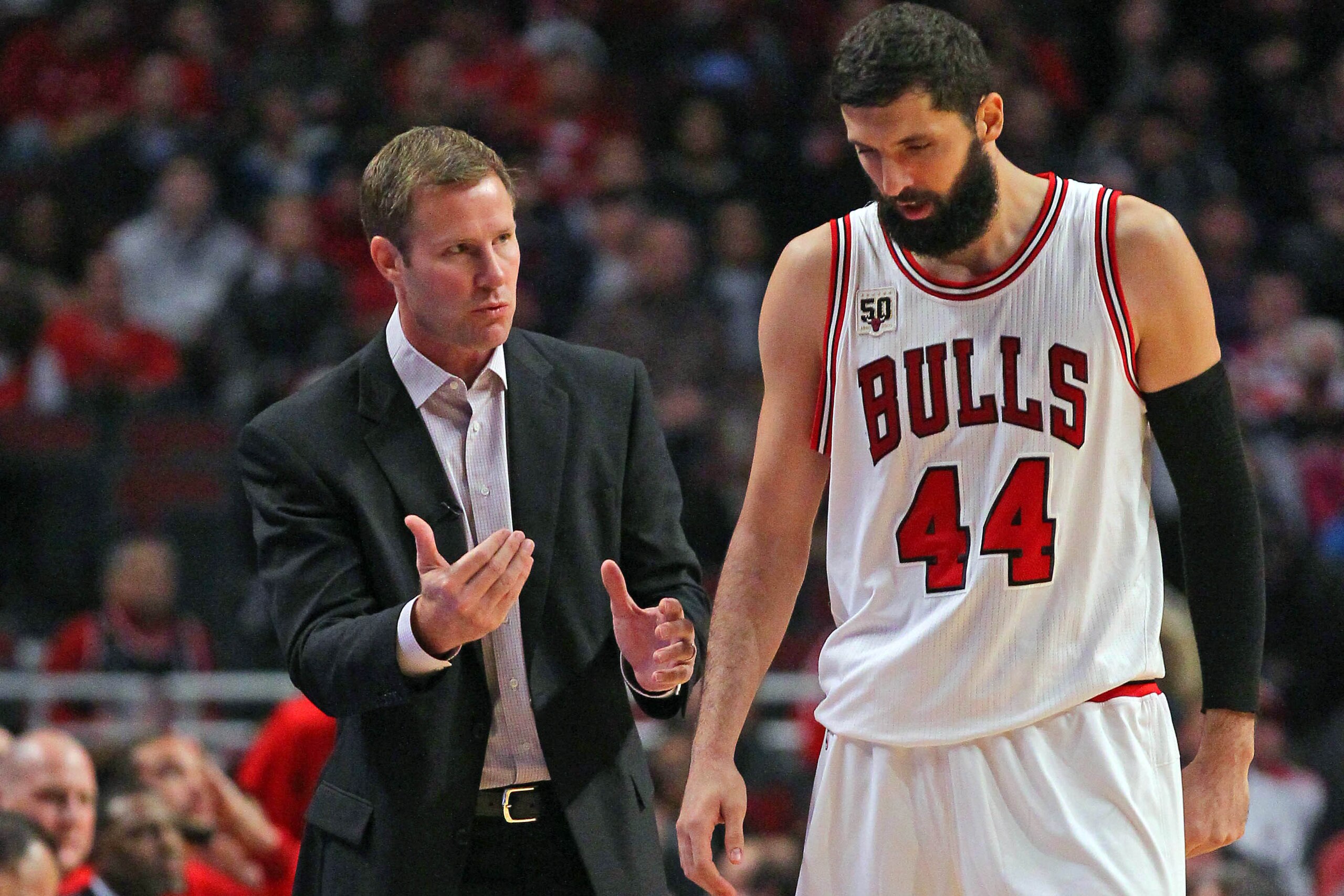 Oct 27, 2015; Chicago, IL, USA; Chicago Bulls head coach Fred Hoiberg talks with forward Nikola Mirotic (44) during the second half against the Cleveland Cavaliers at the United Center. Chicago won 97-95. Mandatory Credit: Dennis Wierzbicki-USA TODAY Spor