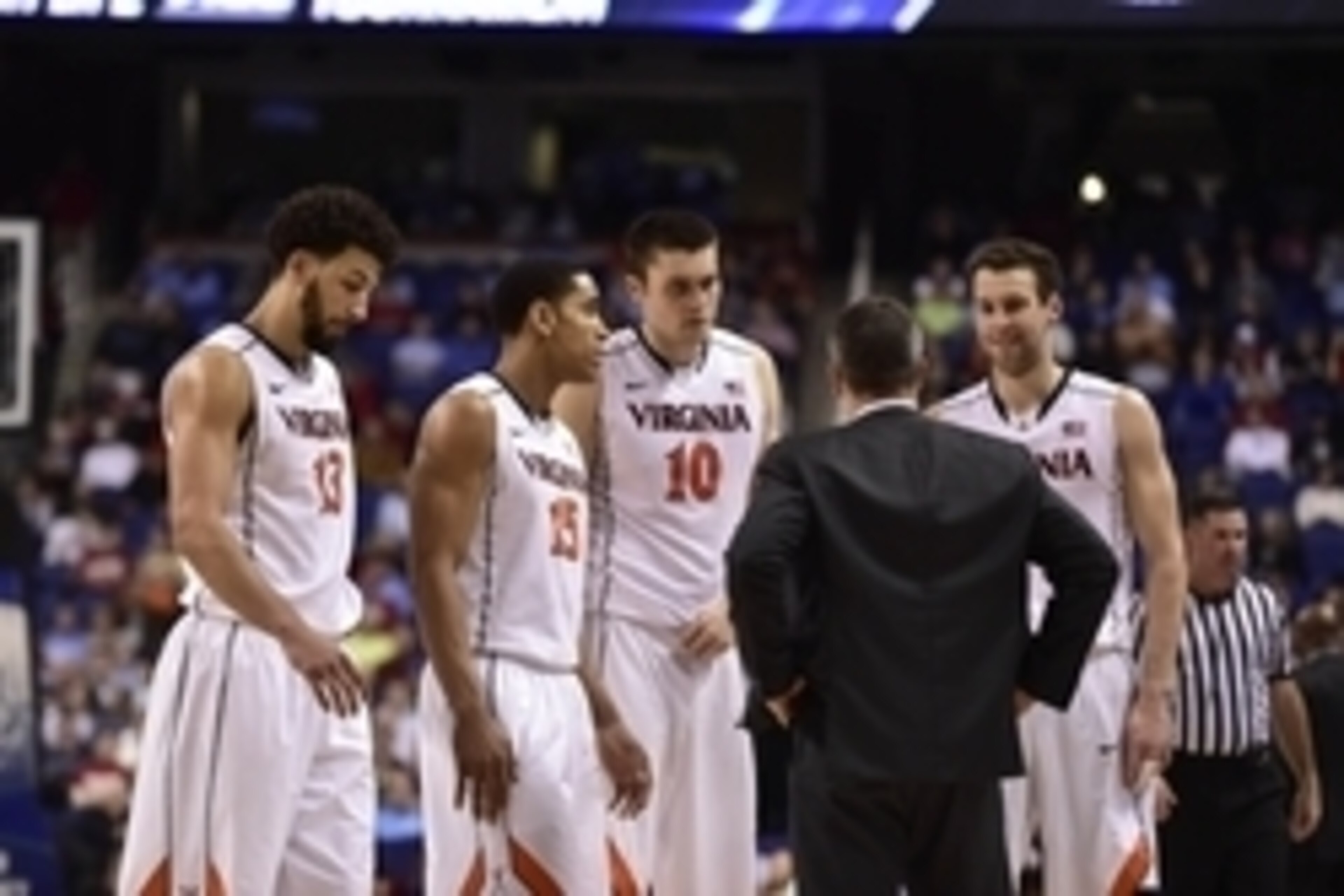 Mar 12, 2015; Greensboro, NC, USA; Virginia Cavaliers head coach Tony Bennett talks with forward Anthony Gill (13) and guard Malcolm Brogdon (15) and forward/center Mike Tobey (10) and forward Evan Nolte (11) in the second half. The Cavaliers defeated the Mar 12, 2015; Greensboro, NC, USA; Virginia Cavaliers head coach Tony Bennett talks with forward Anthony Gill (13) and guard Malcolm Brogdon (15) and forward/center Mike Tobey (10) and forward Evan Nolte (11) in the second half. The Cavaliers defeated the