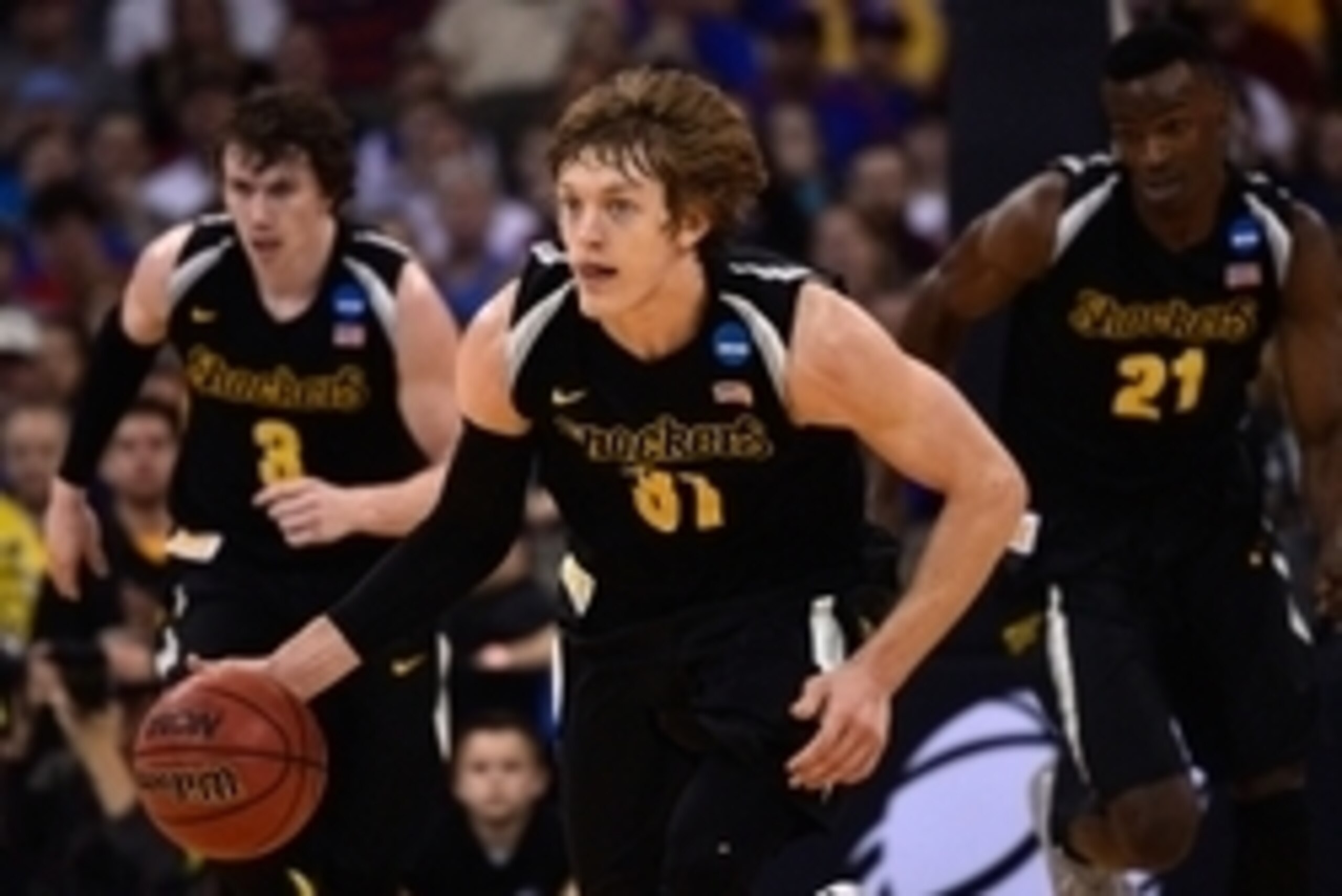 Mar 22, 2015; Omaha, NE, USA; Wichita State Shockers guard Ron Baker (31) controls the ball against the Kansas Jayhawks during the first half in the third round of the 2015 NCAA Tournament at CenturyLink Center. Mandatory Credit: Jasen Vinlove-USA TODAY S