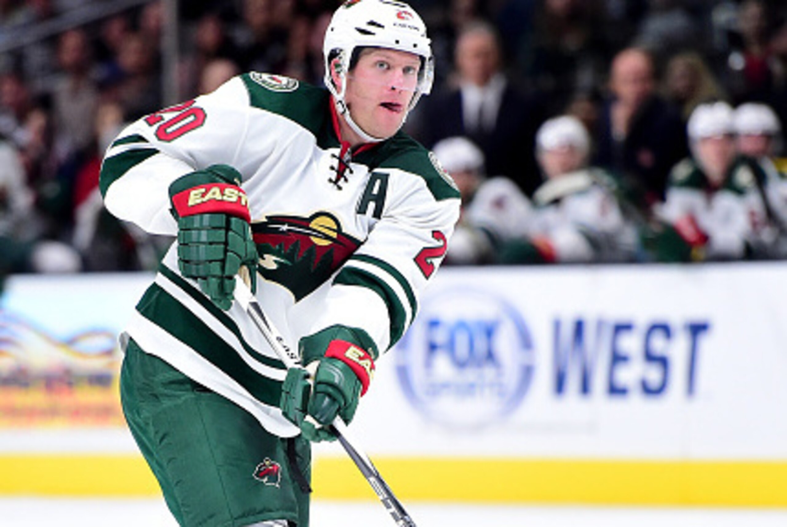 LOS ANGELES, CA - OCTOBER 16:  Ryan Suter #20 of the Minnesota Wild makes a pass agianst the Los Angeles Kings at Staples Center on October 16, 2015 in Los Angeles, California.  (Photo by Harry How/Getty Images)