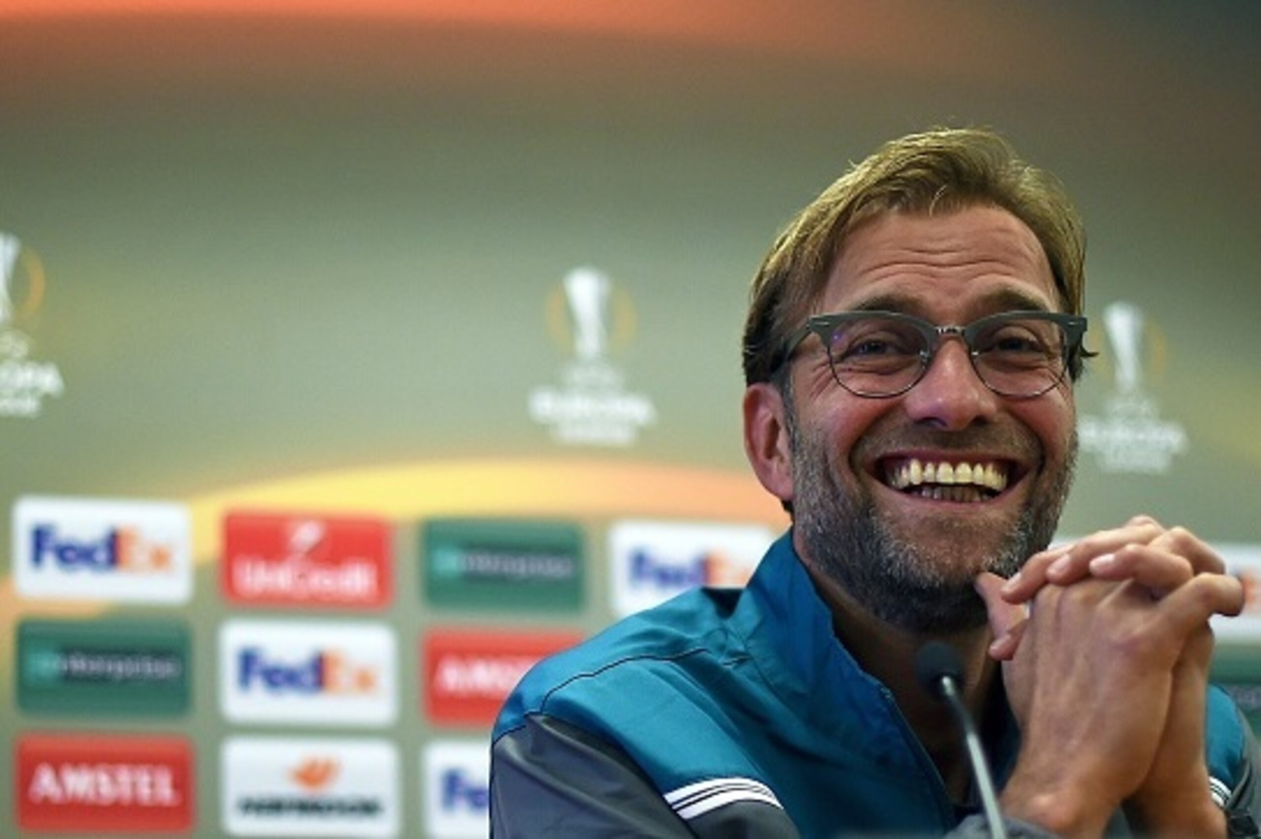 Liverpool's German manager Jurgen Klopp gives a press conference in Liverpool, northwest England, on October 21, 2015, on the eve of their UEFA Europa League group B football match against Rubin Kazan. AFP PHOTO / PAUL ELLIS (Photo credit should re Liverpool's German manager Jurgen Klopp gives a press conference in Liverpool, northwest England, on October 21, 2015, on the eve of their UEFA Europa League group B football match against Rubin Kazan. AFP PHOTO / PAUL ELLIS (Photo credit should re