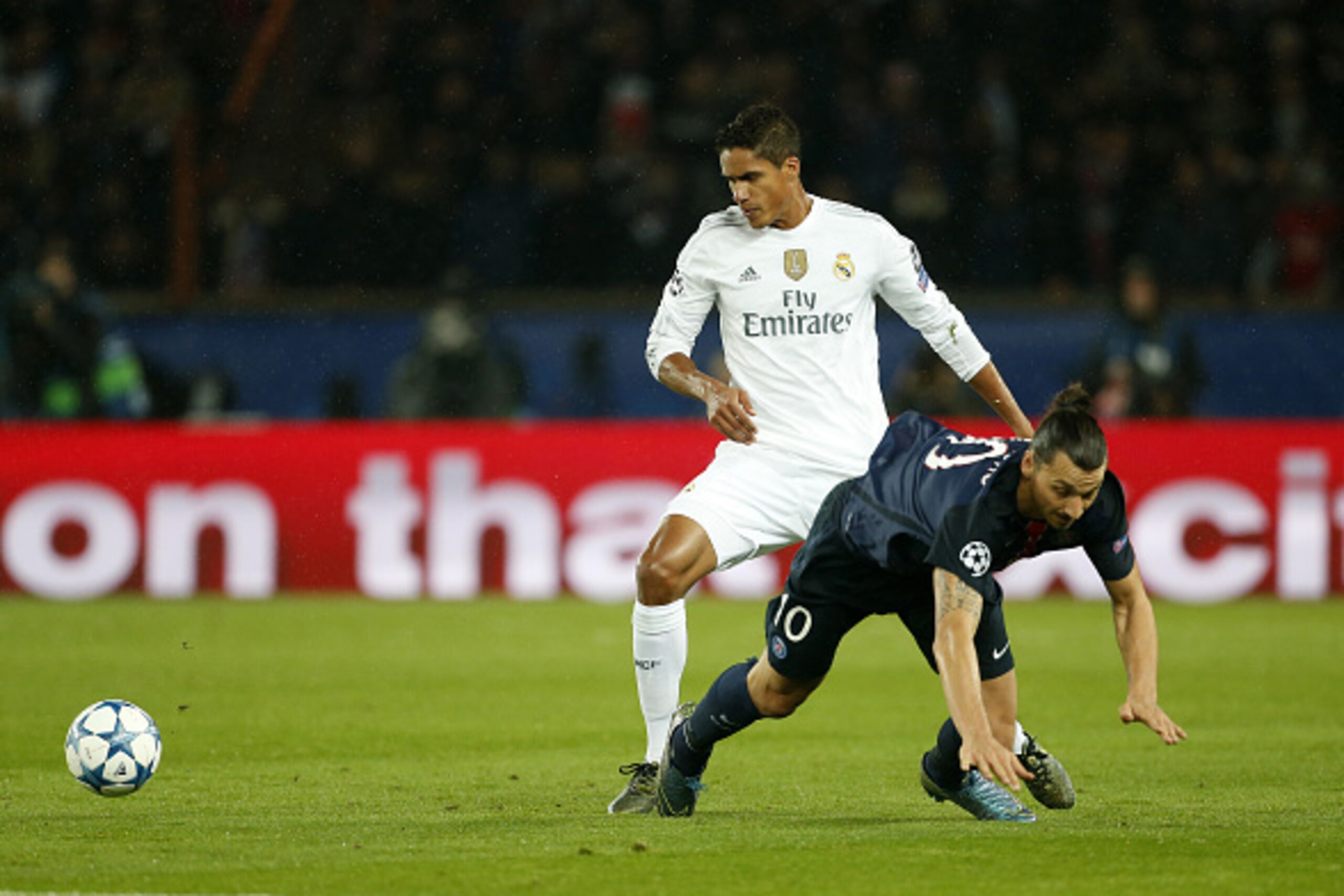 PARIS, FRANCE - OCTOBER 21: Raphael Varane of Real Madrid and Zlatan Ibrahimovic of PSG in action during the UEFA Champions League match between Paris Saint-Germain (PSG) and Real Madrid at Parc des Princes stadium on October 21, 2015 in Paris, France. (P