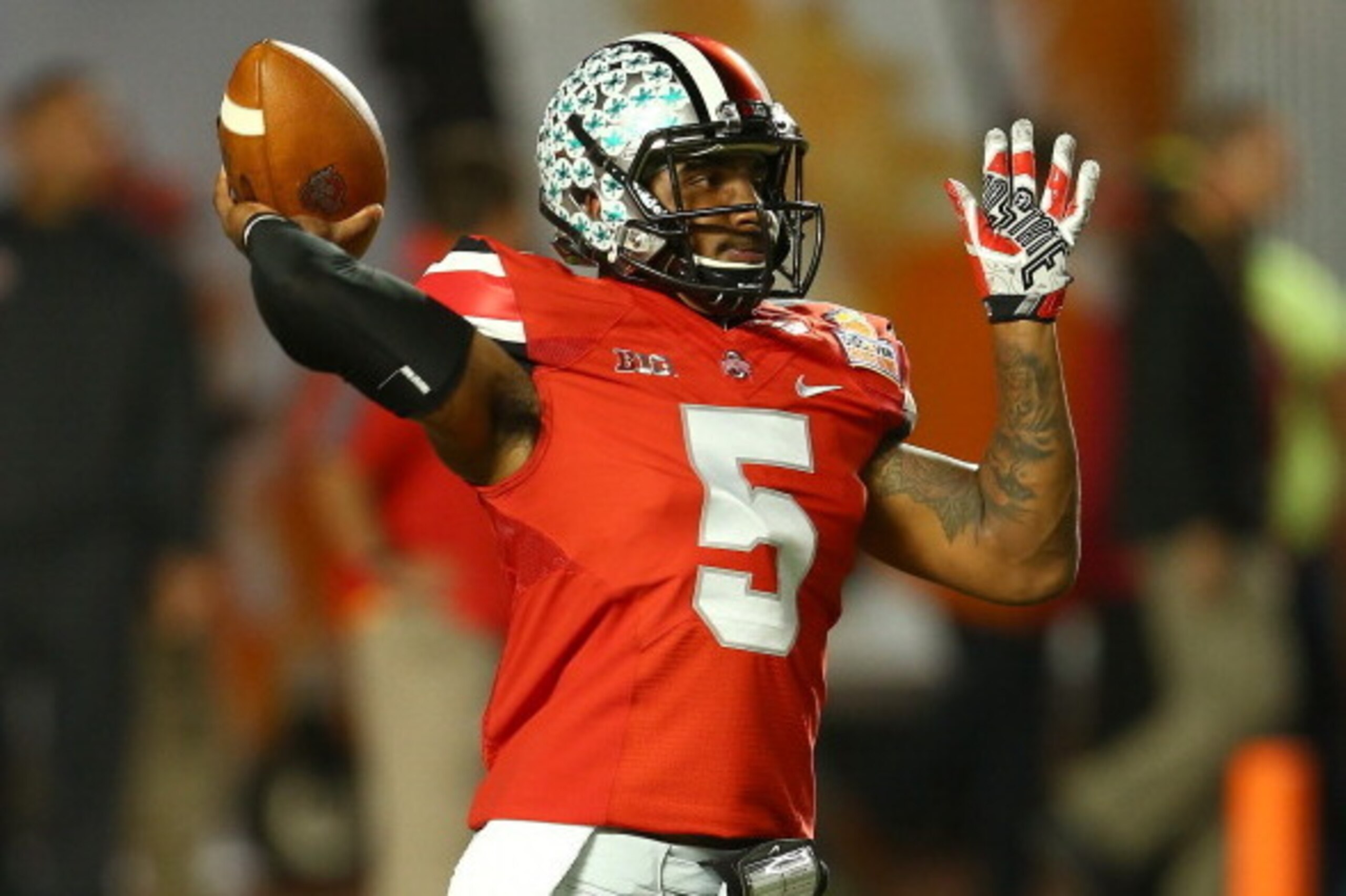 MIAMI GARDENS, FL - JANUARY 03: Braxton Miller #5 of the Ohio State Buckeyes warms up prior to the Discover Orange Bowl against the Clemson Tigers at Sun Life Stadium on January 3, 2014 in Miami Gardens, Florida. (Photo by Streeter Lecka/Getty Images) MIAMI GARDENS, FL - JANUARY 03: Braxton Miller #5 of the Ohio State Buckeyes warms up prior to the Discover Orange Bowl against the Clemson Tigers at Sun Life Stadium on January 3, 2014 in Miami Gardens, Florida. (Photo by Streeter Lecka/Getty Images)