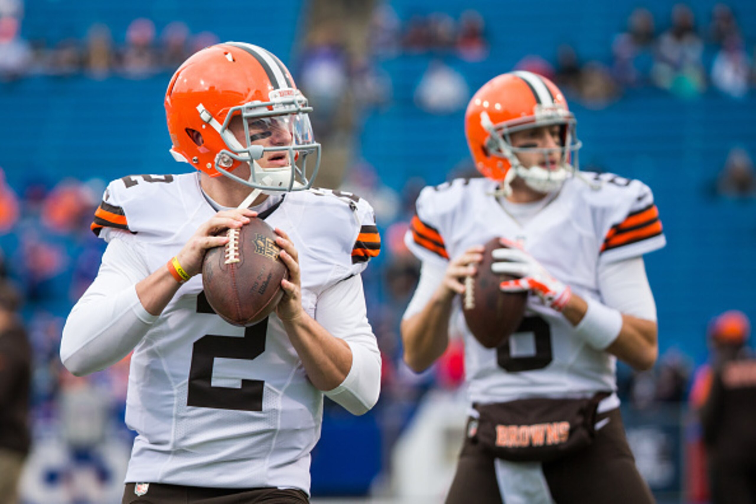 ORCHARD PARK, NY - NOVEMBER 30:  Johnny Manziel #2 of the Cleveland Browns and Brian Hoyer #6 warms up before the game against the Buffalo Bills on November 30, 2014 at Ralph Wilson Stadium in Orchard Park, New York.  Buffalo defeats Cleveland 26-10. (Pho