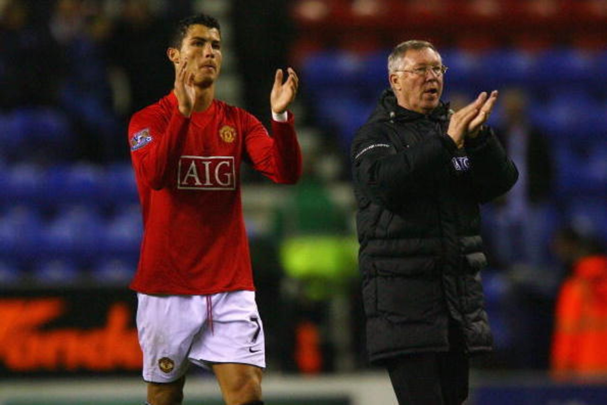 WIGAN, ENGLAND - MAY 13:  Sir Alex Ferguson the manager of Manchester United and Cristiano Ronaldo celebrate after the Barclays Premier League match between Wigan Athletic and Manchester United at the JJB Stadium on May 13, 2009 in Wigan, England.  (Photo