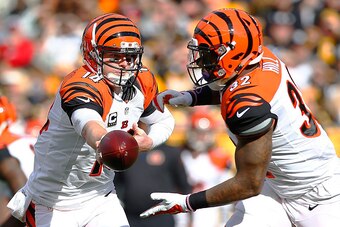 PITTSBURGH, PA - NOVEMBER 01:  Andy Dalton #14 of the Cincinnati Bengals hands off to Jeremy Hill #32 during the 1st half of the game against the Pittsburgh Steelers at Heinz Field on November 1, 2015 in Pittsburgh, Pennsylvania.  (Photo by Jared Wickerha
