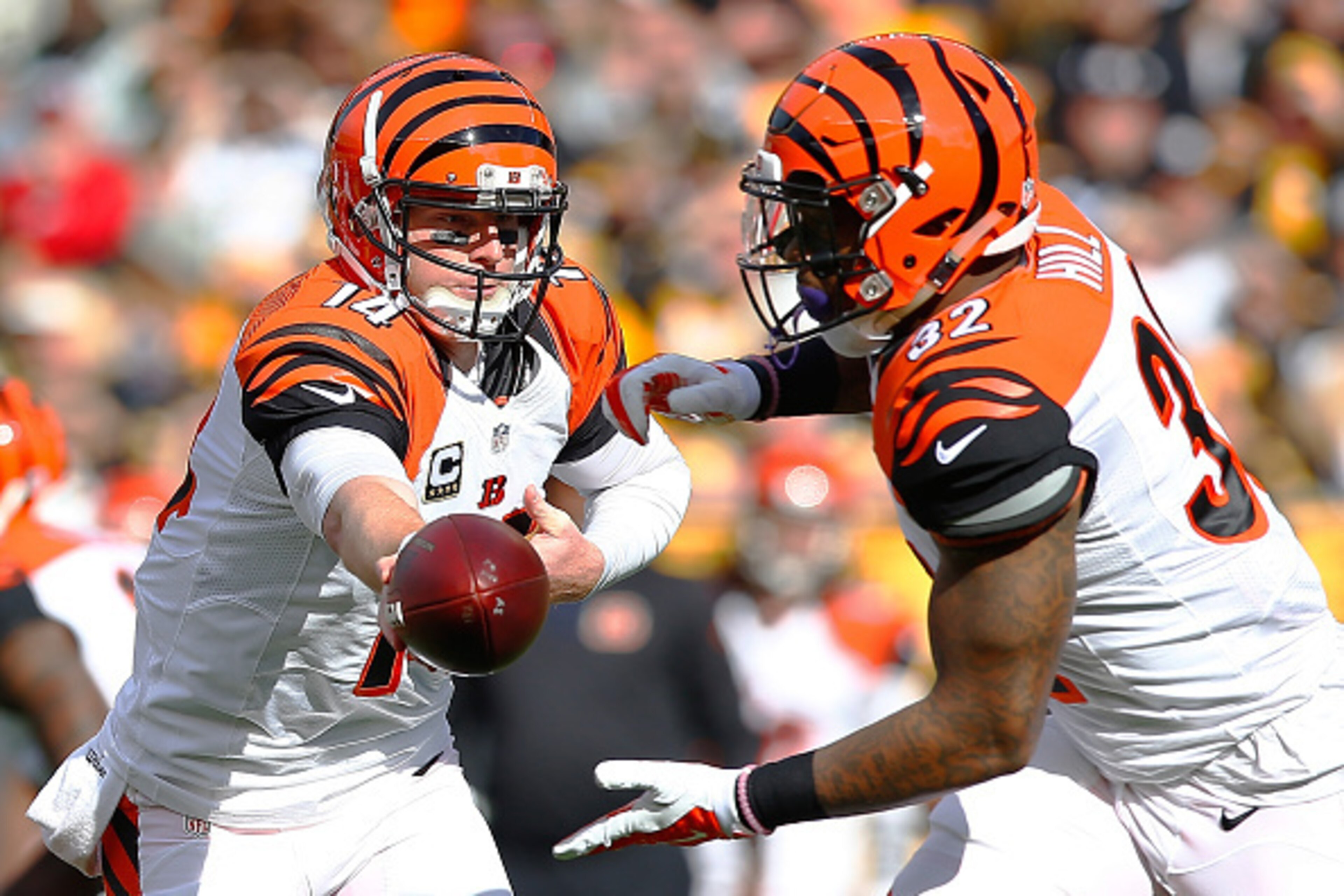 PITTSBURGH, PA - NOVEMBER 01:  Andy Dalton #14 of the Cincinnati Bengals hands off to Jeremy Hill #32 during the 1st half of the game against the Pittsburgh Steelers at Heinz Field on November 1, 2015 in Pittsburgh, Pennsylvania.  (Photo by Jared Wickerha