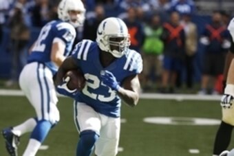 Oct 25, 2015; Indianapolis, IN, USA; Indianapolis Colts running back Frank Gore (23) runs with the ball against the New Orleans Saints at Lucas Oil Stadium. Mandatory Credit: Brian Spurlock-USA TODAY Sports