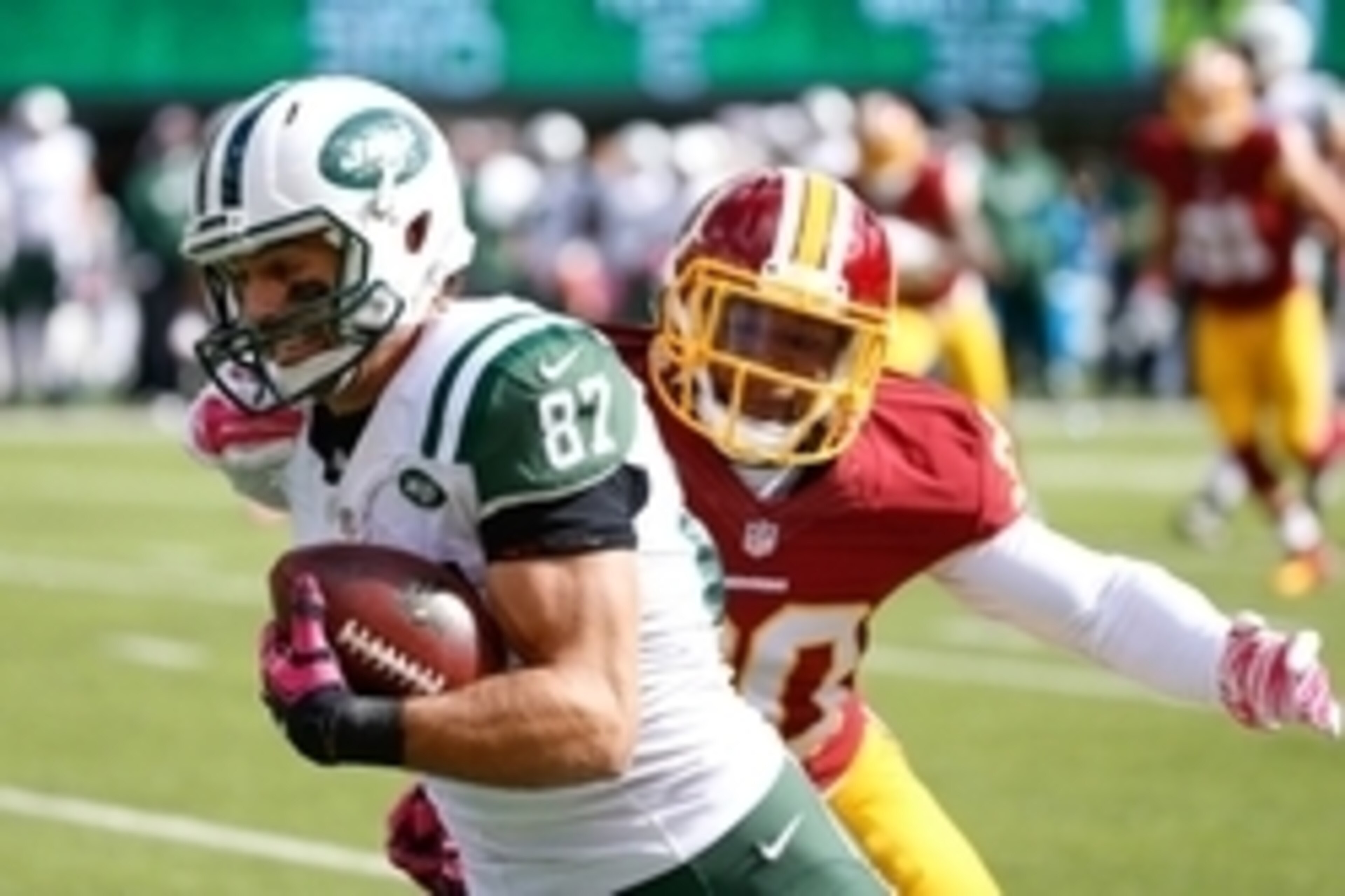 Oct 18, 2015; East Rutherford, NJ, USA; New York Jets wide receiver Eric Decker (87) carries the ball during the first quarter against the Washington Redskins at MetLife Stadium. Mandatory Credit: Vincent Carchietta-USA TODAY Sports
