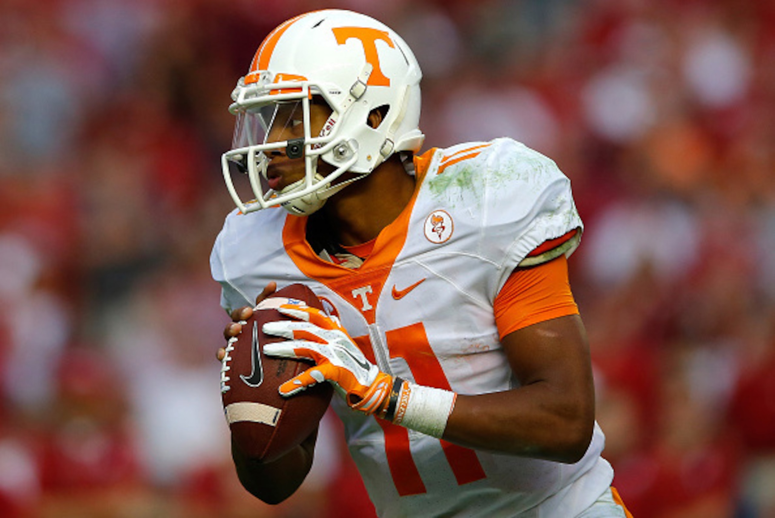 TUSCALOOSA, AL - OCTOBER 24:  Joshua Dobbs #11 of the Tennessee Volunteers looks to pass against the Alabama Crimson Tide at Bryant-Denny Stadium on October 24, 2015 in Tuscaloosa, Alabama.  (Photo by Kevin C. Cox/Getty Images)