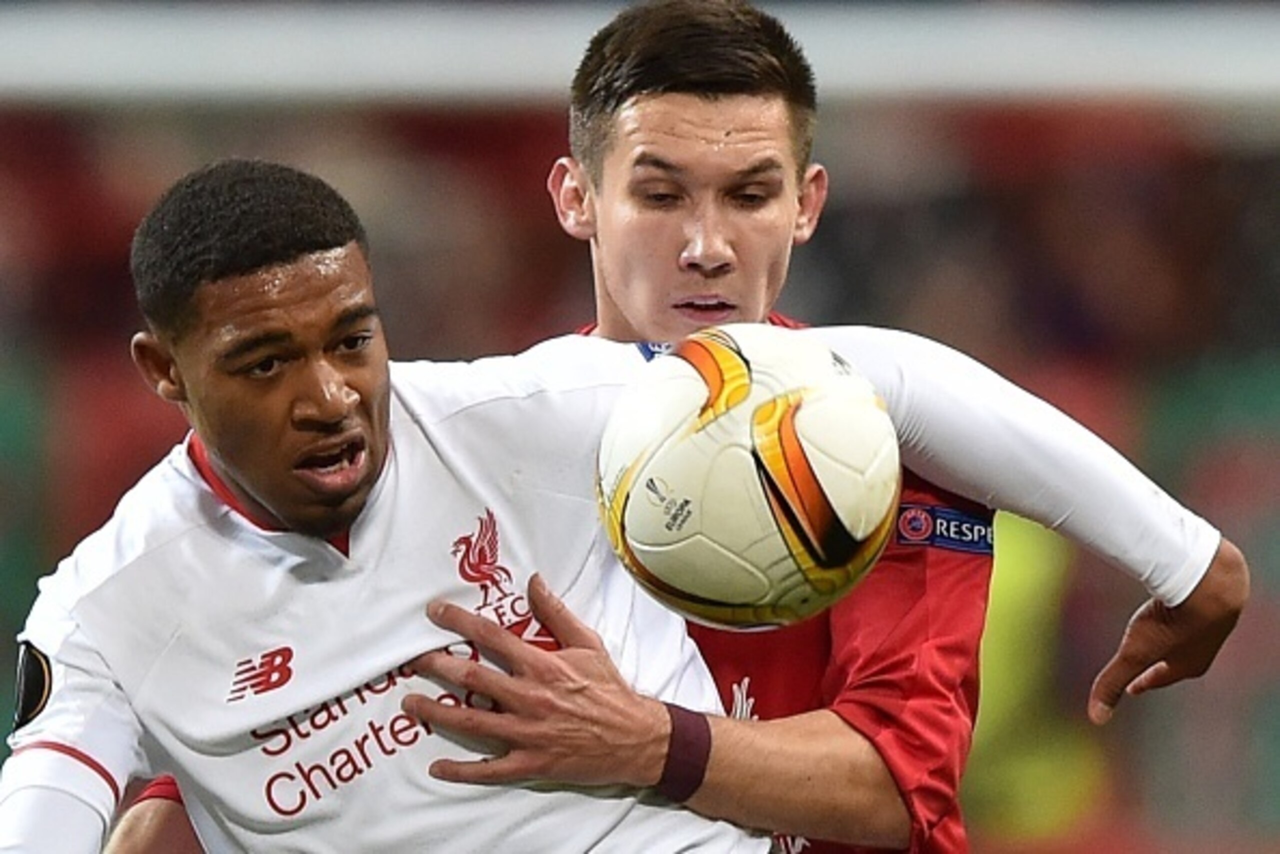 *ALTERNATIVE CROP*
Liverpool's English midfielder Jordon Ibe (L) vies for the ball with Rubin Kazan's Russian midfielder Elmir Nabiullin during the UEFA Europa League group B football match between FC Rubin Kazan and Liverpool FC in Kazan on November 5, 2