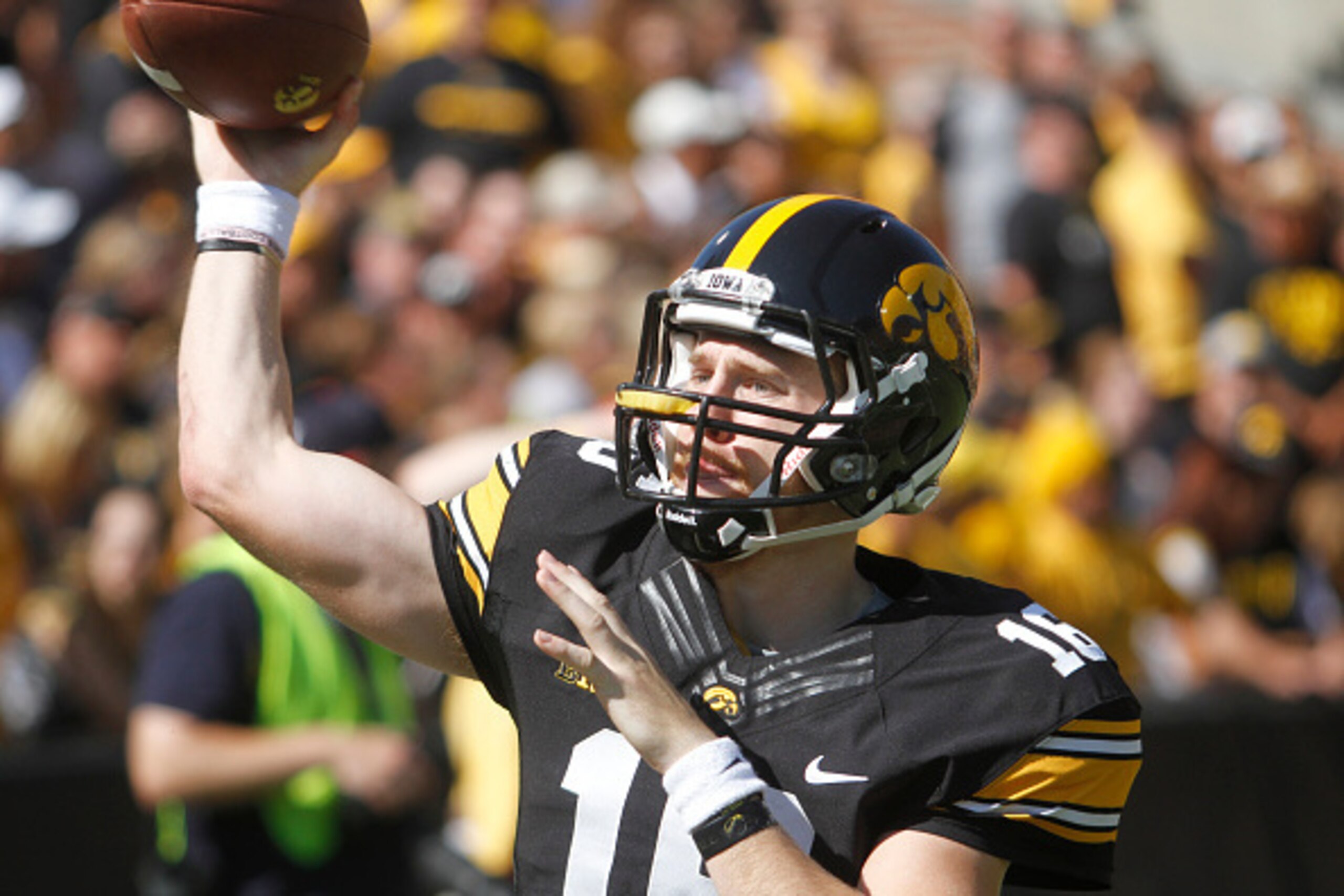 IOWA CITY, IA - SEPTEMBER 26:  Quarterback C.J. Beathard #16 of the Iowa Hawkeyeswarms up before the match-up against the North Texas Mean Green on September 26, 2015 at Kinnick Stadium, in Iowa City, Iowa.  (Photo by Matthew Holst/Getty Images)