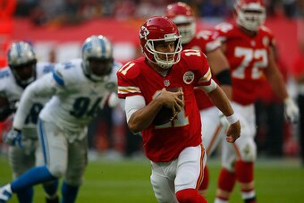 LONDON, ENGLAND - NOVEMBER 01: Alex Smith #11 of Kansas City Chiefs runs during the NFL game between Kansas City Chiefs and Detroit Lions at Wembley Stadium on November 01, 2015 in London, England. (Photo by Alan Crowhurst/Getty Images)