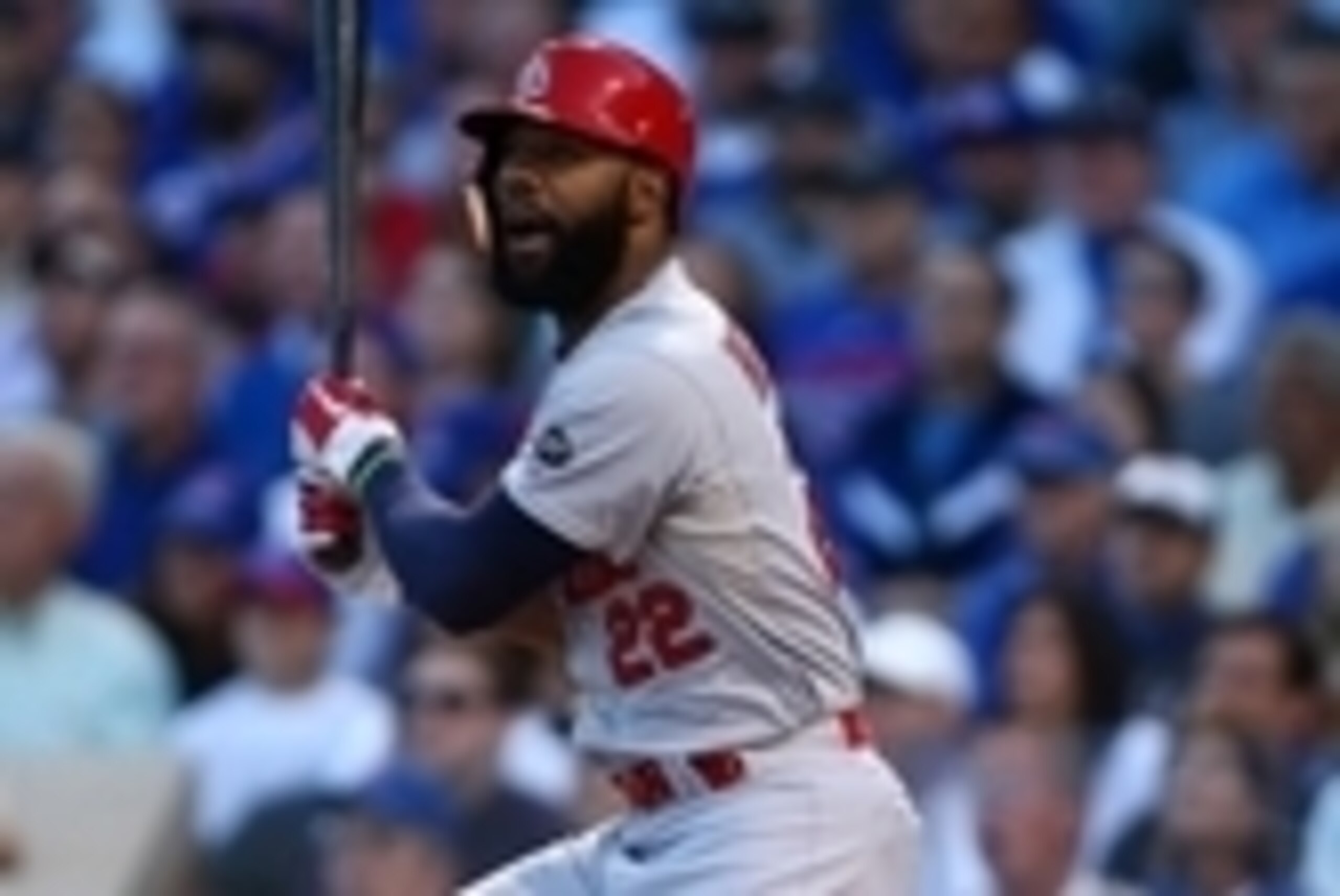 Oct 12, 2015; Chicago, IL, USA; St. Louis Cardinals right fielder Jason Heyward (22) hits a double during the second inning against the Chicago Cubs in game three of the NLDS at Wrigley Field. Mandatory Credit: Jerry Lai-USA TODAY Sports