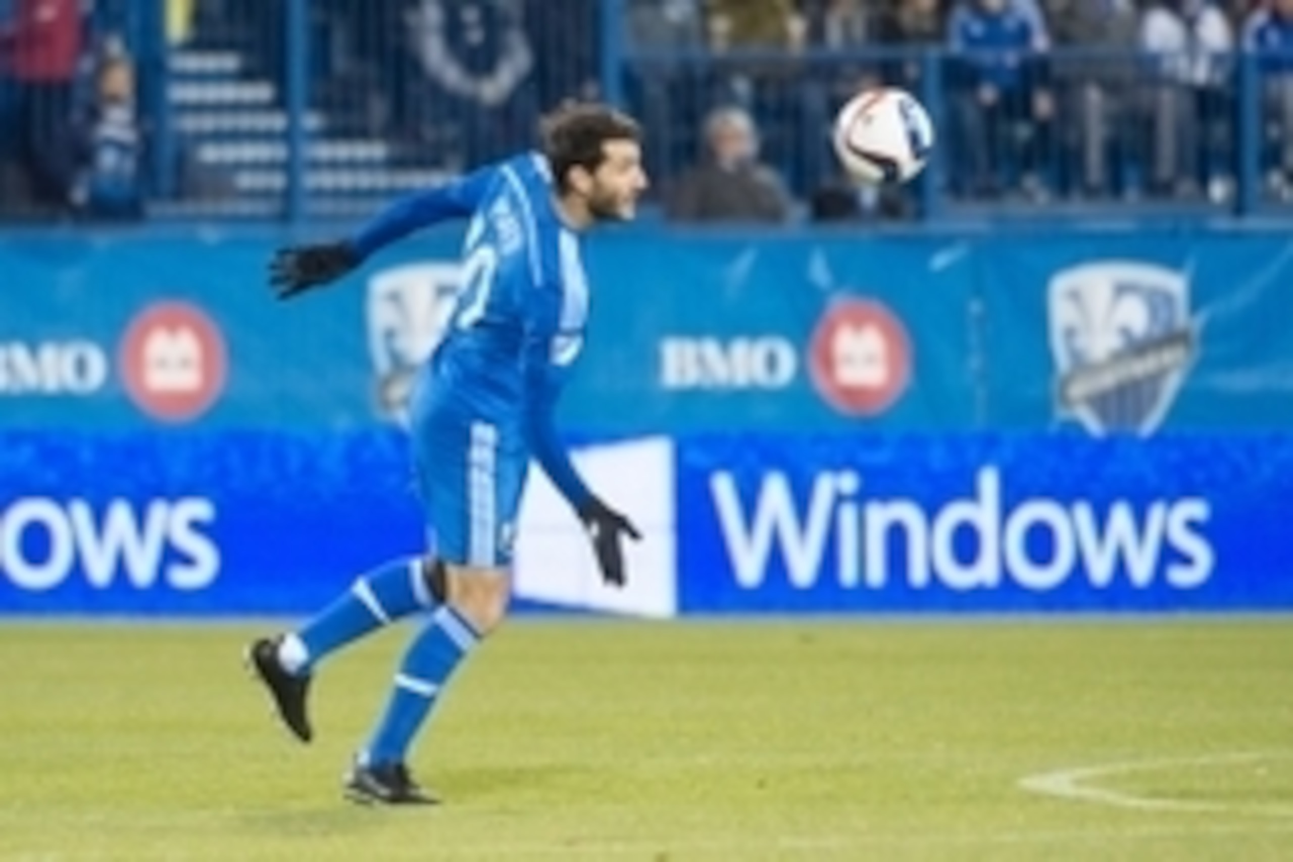 Nov 1, 2015; Montreal, Quebec, CAN;  Montreal Impact midfielder Ignacio Piatti (10) heads the ball in the first half against the Columbus Crew at Stade Saputo. Mandatory Credit: Marc DesRosiers-USA TODAY Sports