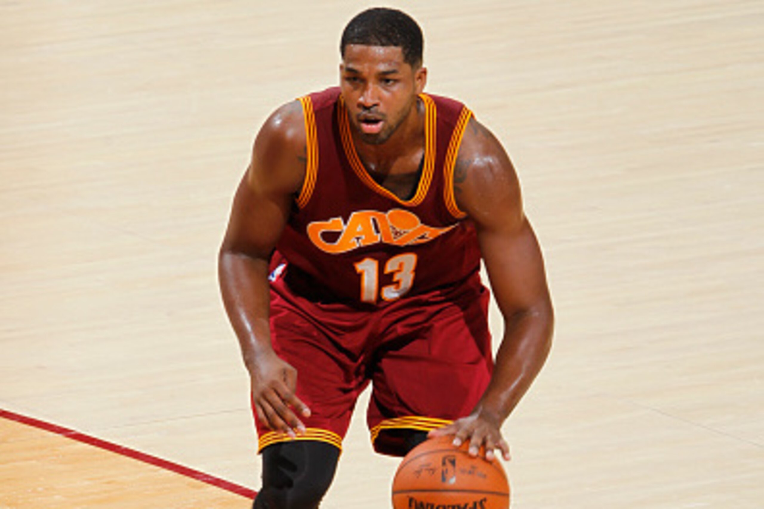 CLEVELAND, OH - OCTOBER 30:  Tristan Thompson #13 of the Cleveland Cavaliers dribbles the ball against the Miami Heat on October 30, 2015 at Quicken Loans Arena in Cleveland, Ohio. NOTE TO USER: User expressly acknowledges and agrees that, by downloading 