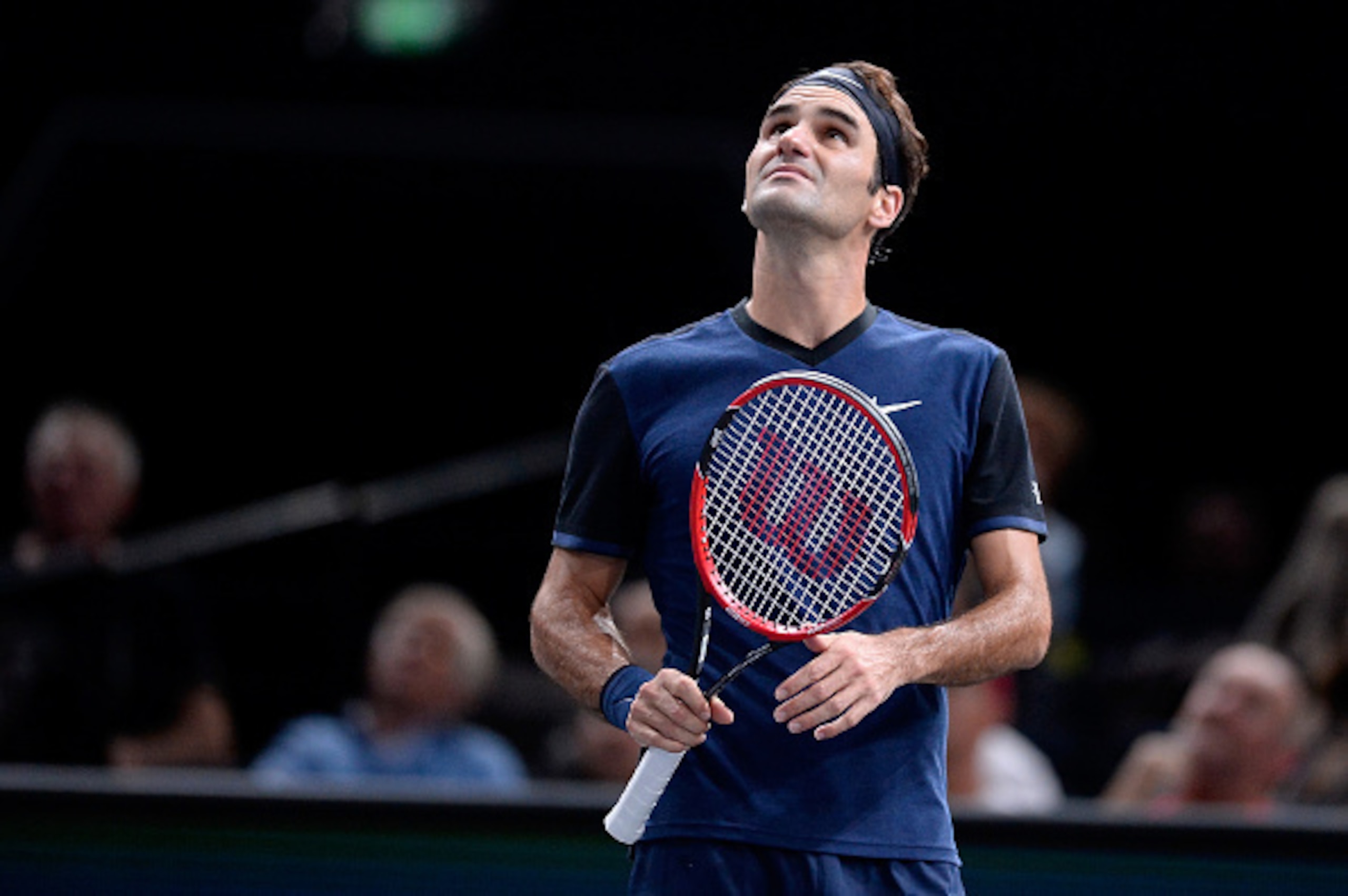 PARIS, FRANCE - NOVEMBER 05:  Roger Federer of Switzerland reacts during his Men's 1/8 finals match against John Isner of the United States of America on day four of the BNP Paribas Masters at Palais Omnisports de Bercy on November 5, 2015 in Paris, Franc