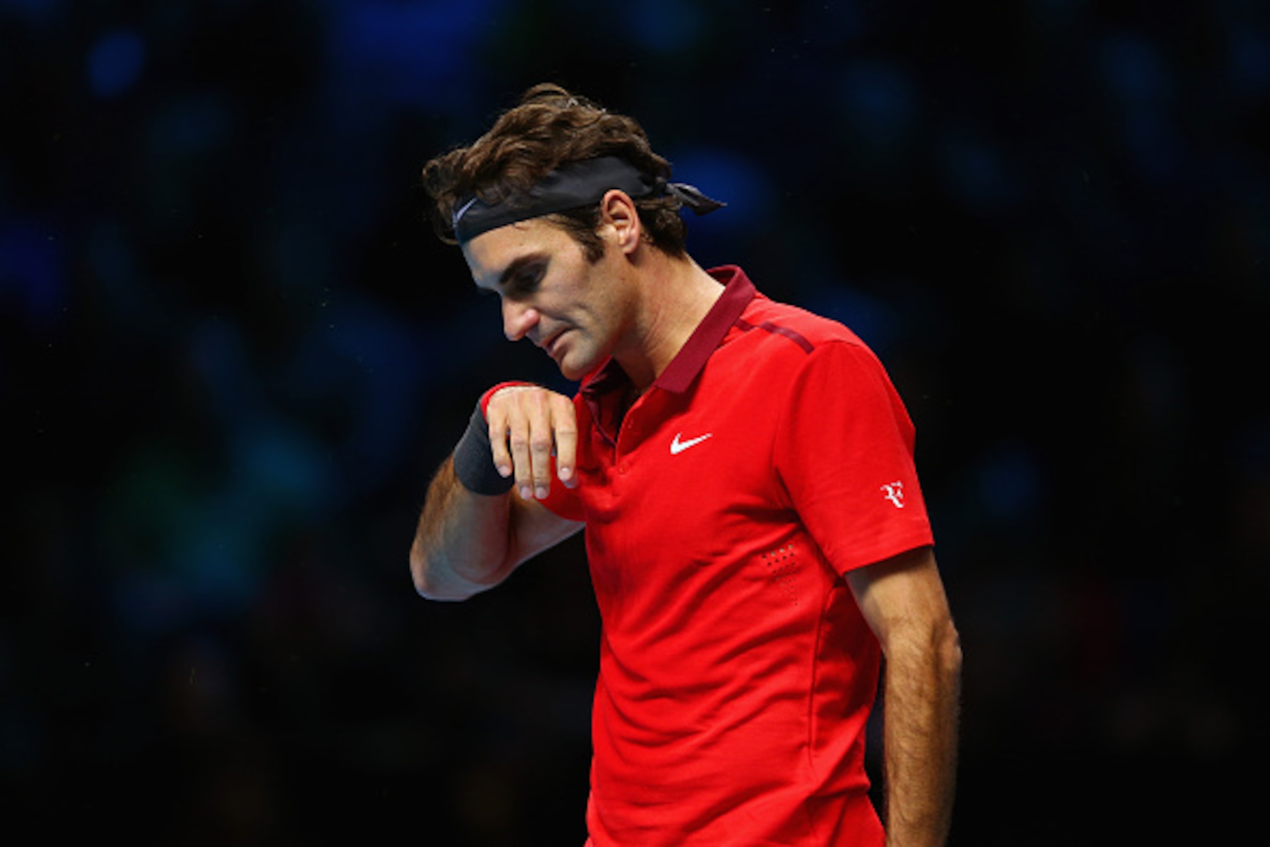 LONDON, ENGLAND - NOVEMBER 15:  Roger Federer of Switzerland during the singles semi-final match against Stan Wawrinka of Switzerland on day seven of the Barclays ATP World Tour Finals at O2 Arena on November 15, 2014 in London, England.  (Photo by Clive 