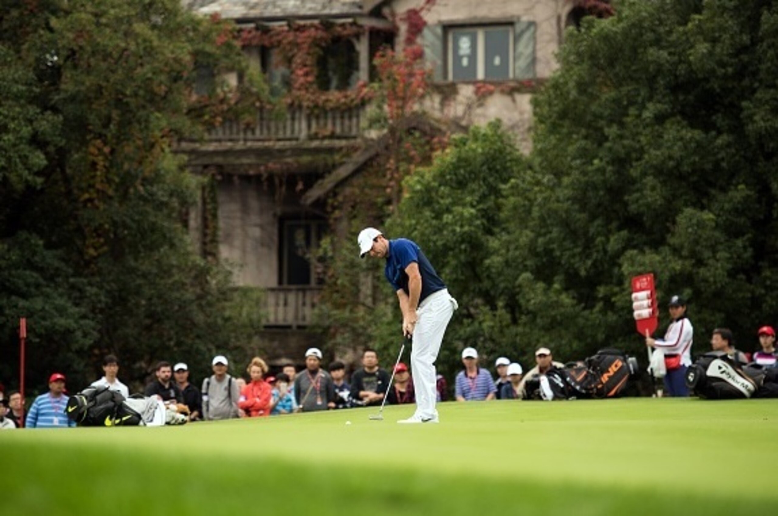 Rory McIlroy of Northern Ireland plays a shot  during the WGC-HSBC Champions golf tournament in Shanghai on November 6, 2015. The WGC-HSBC Champions tournament takes place at Shanghai's Sheshan International Golf Club to November 8. AFP PHOTO / JOHANNES E