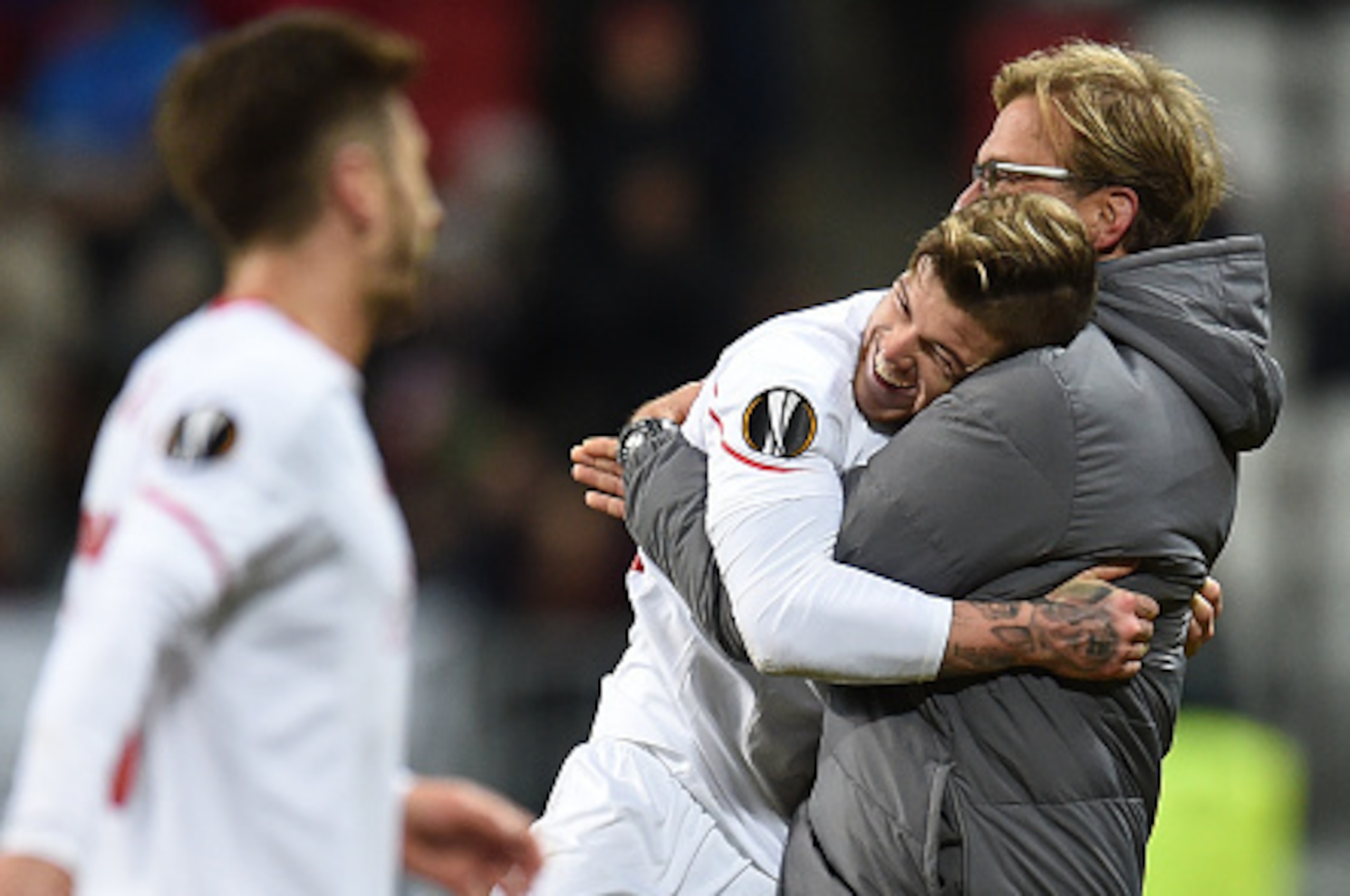 KAZAN, RUSSIA - NOVEMBER 05: Head coach Jurgen Klopp (R) and Alberto Moreno of Liverpool FC celebrate after their victory over FC Rubin Kazan in the UEFA Europa League group B match between FC Rubin Kazan and Liverpool FC at the Kazan Arena Stadium on Nov KAZAN, RUSSIA - NOVEMBER 05: Head coach Jurgen Klopp (R) and Alberto Moreno of Liverpool FC celebrate after their victory over FC Rubin Kazan in the UEFA Europa League group B match between FC Rubin Kazan and Liverpool FC at the Kazan Arena Stadium on Nov