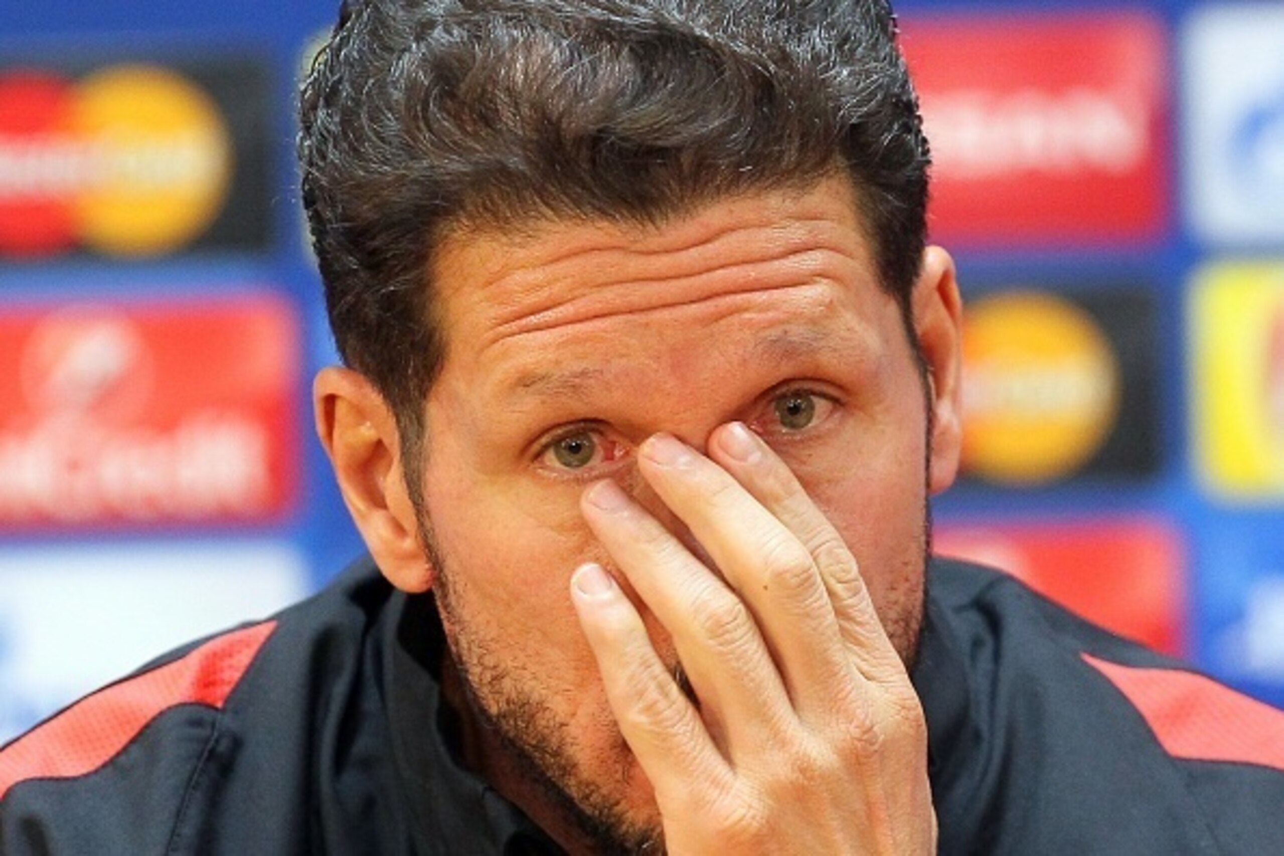 Atletico Madrid's coach Diego Simeone attends a press conference in Astana on November 2, 2015 on the eve of the UEFA Champions League group C football match between FC Astana and Club Atletico de Madrid. AFP PHOTO / STANISLAV FILIPPOV        (Photo credi