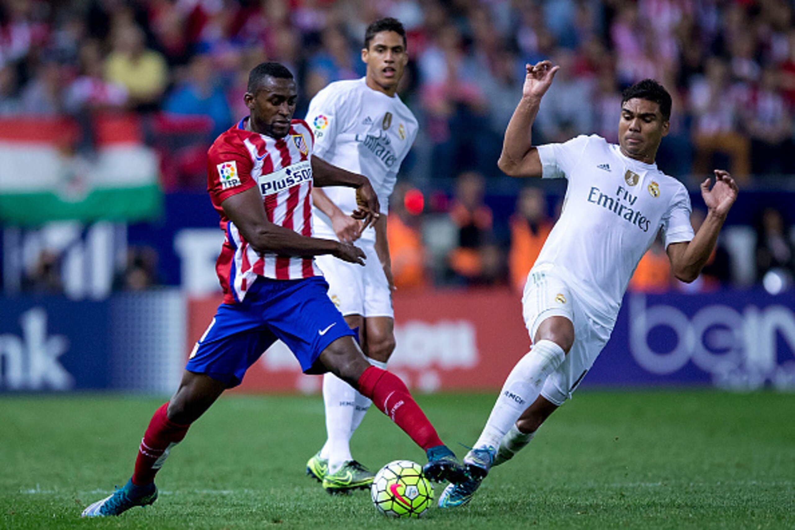 MADRID, SPAIN - OCTOBER 04: Carlos Casemiro (R) of Real Madrid CF competes for the ball with Jackson Arley Martinez  (L) of Atletico de Madrid during the La Liga match between Club Atletico de Madrid and Real Madrid CF at Vicente Calderon Stadium on Octob