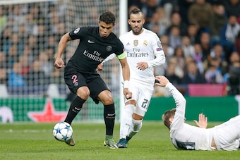 MADRID, SPAIN - NOVEMBER 3: Thiago Silva of PSG and Jese Rodriguez of Real Madrid in action during the UEFA Champions League match between Real Madrid and Paris Saint-Germain (PSG) at Santiago Bernabeu stadium on November 3, 2015 in Madrid, Spain. (Photo 