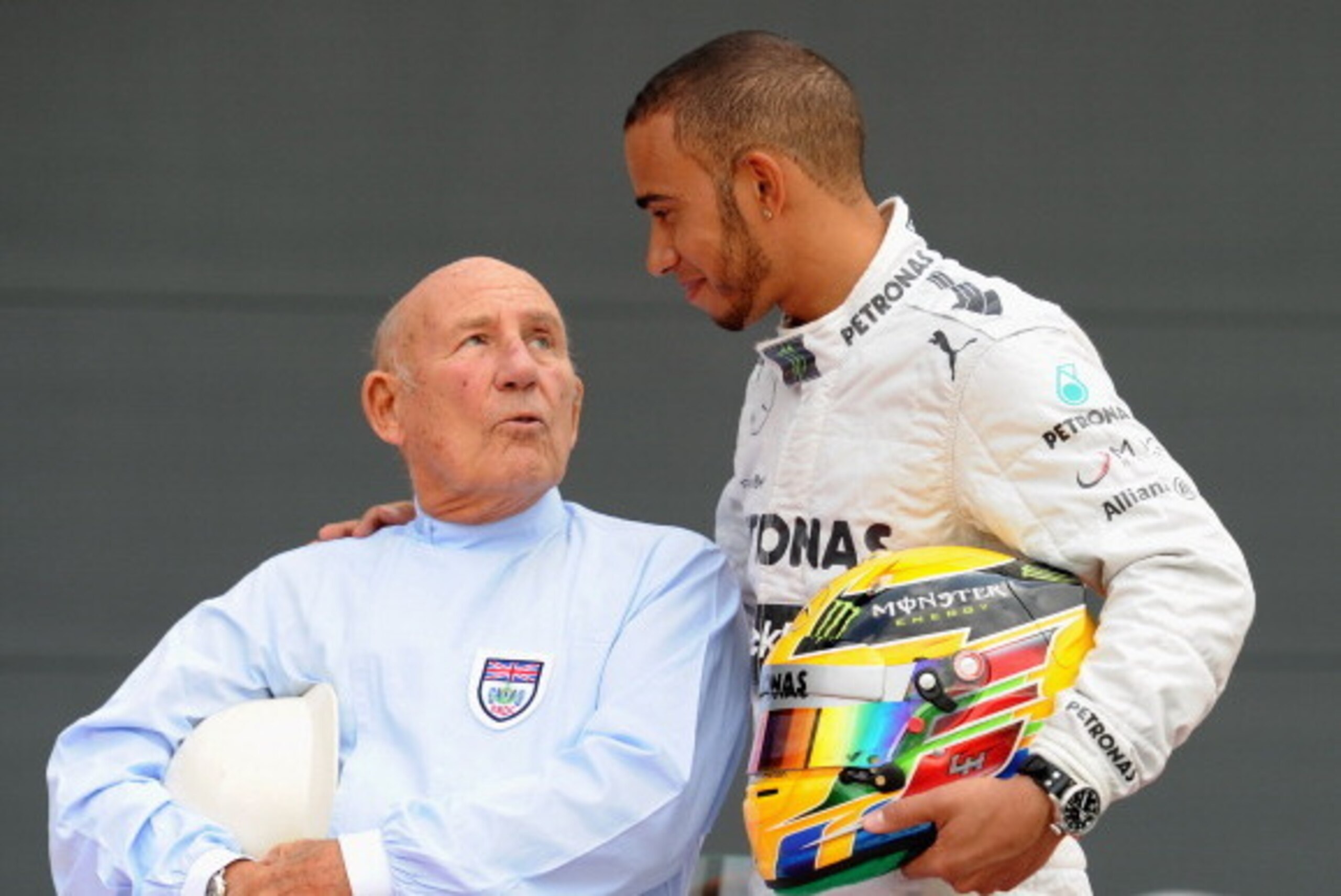 NORTHAMPTON, ENGLAND - MAY 31:  Sir Stirling Moss and Mercedes AMG Petronas F1 driver Lewis Hamilton meet at Silverstone Circuit on May 31, 2013 in Northampton, England.  (Photo by Shaun Botterill/Getty Images)