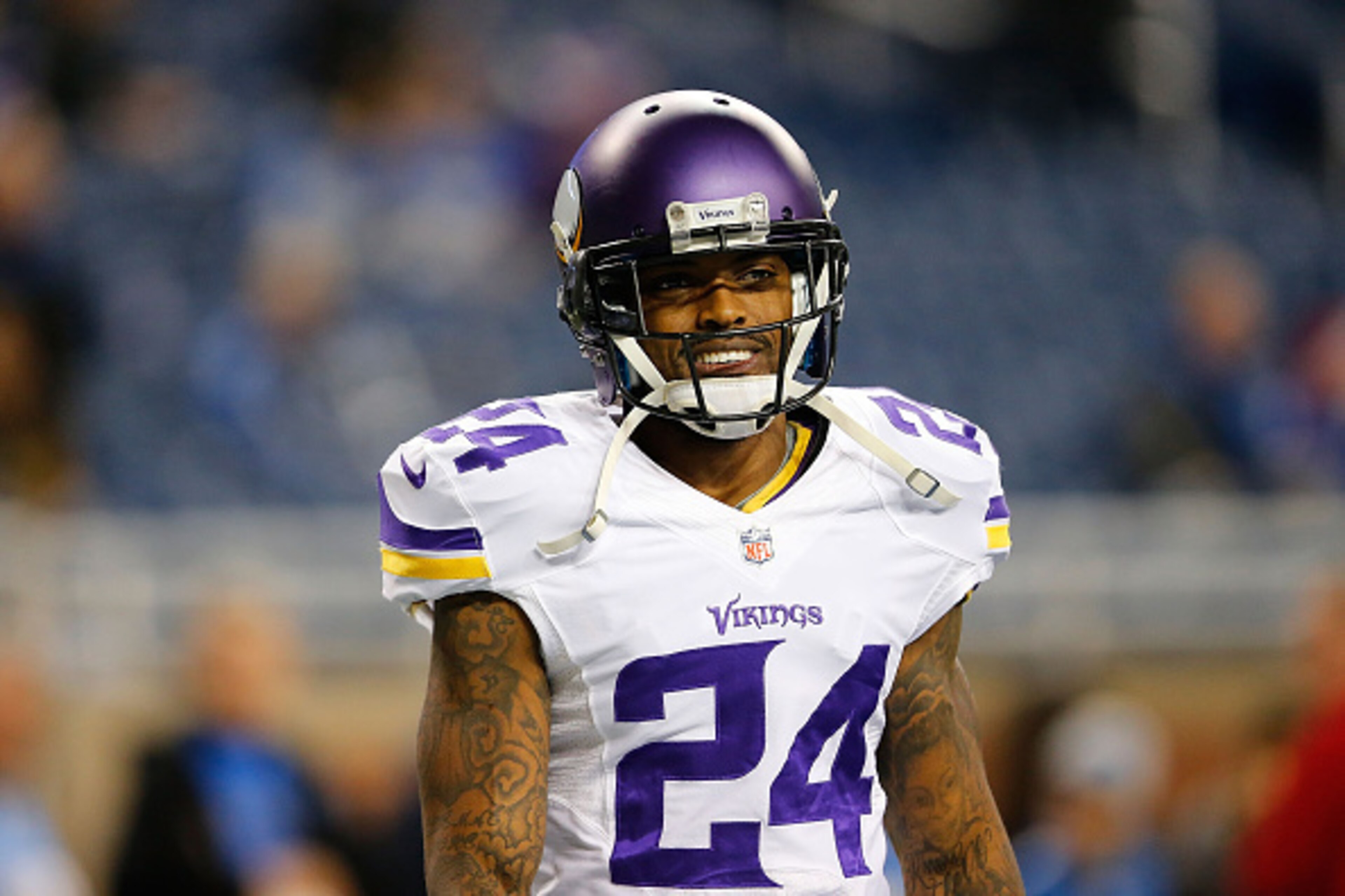 DETROIT, MI - DECEMBER 14: Captain Munnerlyn #24 of the Minnesota Vikings warms up prior to the start of the game against the Detroit Lions at Ford Field on December 14, 2014 in Detroit, Michigan. The Lions defeated the Vikings 16-14. (Photo by Leon Hal DETROIT, MI - DECEMBER 14: Captain Munnerlyn #24 of the Minnesota Vikings warms up prior to the start of the game against the Detroit Lions at Ford Field on December 14, 2014 in Detroit, Michigan. The Lions defeated the Vikings 16-14. (Photo by Leon Hal