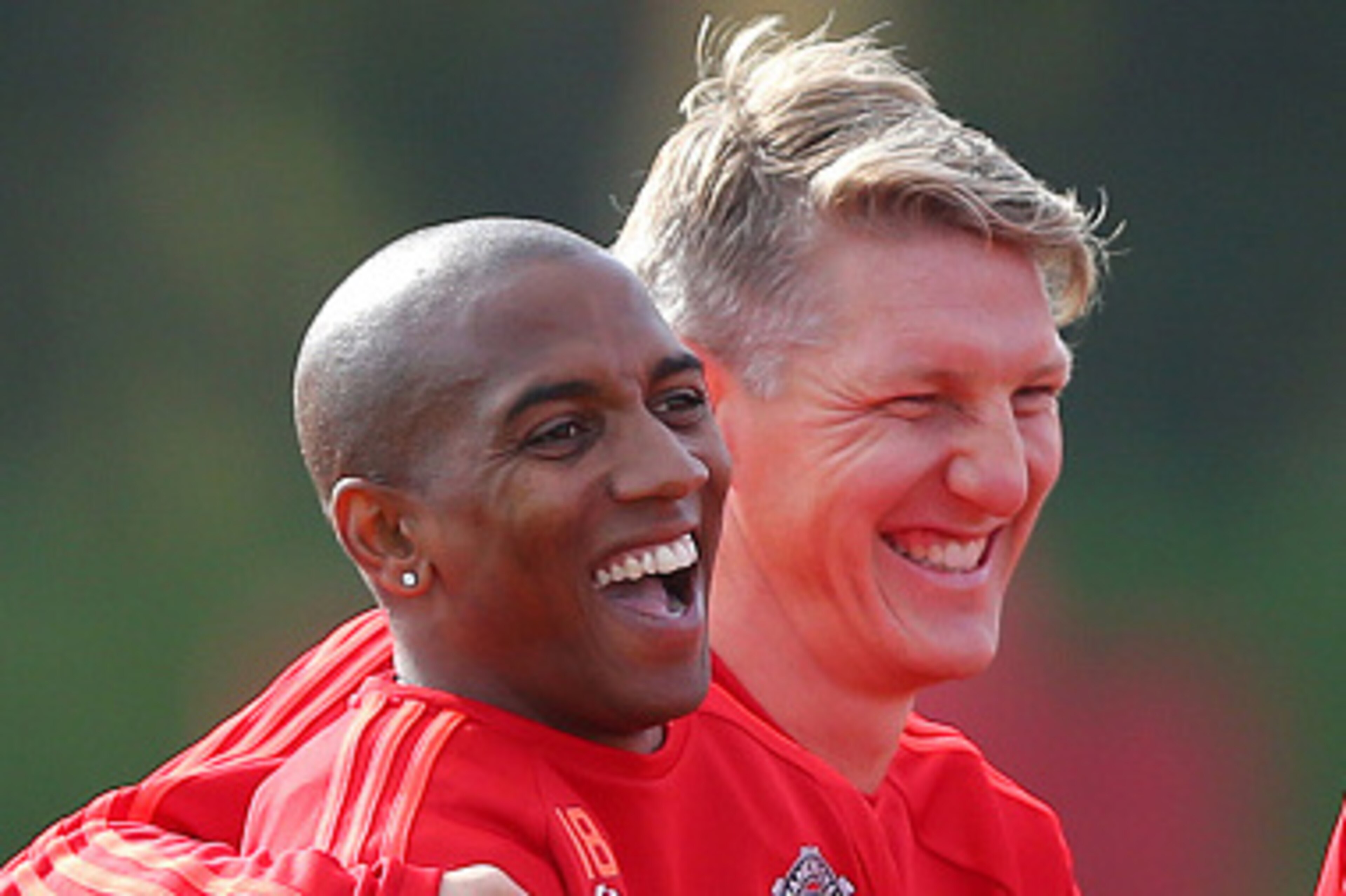 MANCHESTER, ENGLAND - SEPTEMBER 29: Ashley Young of Manchester United laughs alongside Bastian Schweinsteiger, right, during a Manchester United training session at the Aon Training Complex on September 29, 2015 in Manchester, England. (Photo by Dave Thom MANCHESTER, ENGLAND - SEPTEMBER 29: Ashley Young of Manchester United laughs alongside Bastian Schweinsteiger, right, during a Manchester United training session at the Aon Training Complex on September 29, 2015 in Manchester, England. (Photo by Dave Thom