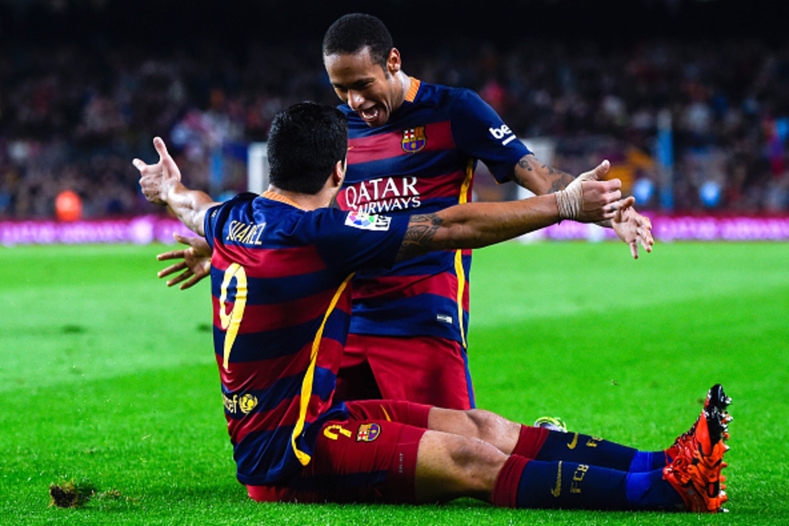 BARCELONA, SPAIN - OCTOBER 25:  Luis Suarez of FC Barcelona celebrates with his teammate Neymar of FC Barcelona after scoring his team's third goal during the La Liga match between FC Barcelona and SD Eibar at Camp Nou on October 25, 2015 in Barcelona, Sp