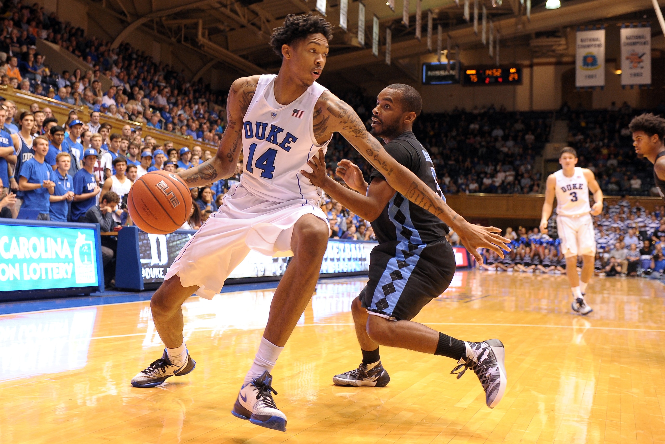 DURHAM, NC - NOVEMBER 04: Brandon Ingram #14 of the Duke Blue Devils drives against Daryl Traynham #3 of the Livingstone Blue Bears at Cameron Indoor Stadium on November 4, 2015 in Durham, North Carolina. Duke defeated Livingstone 119-54. (Photo by Lance