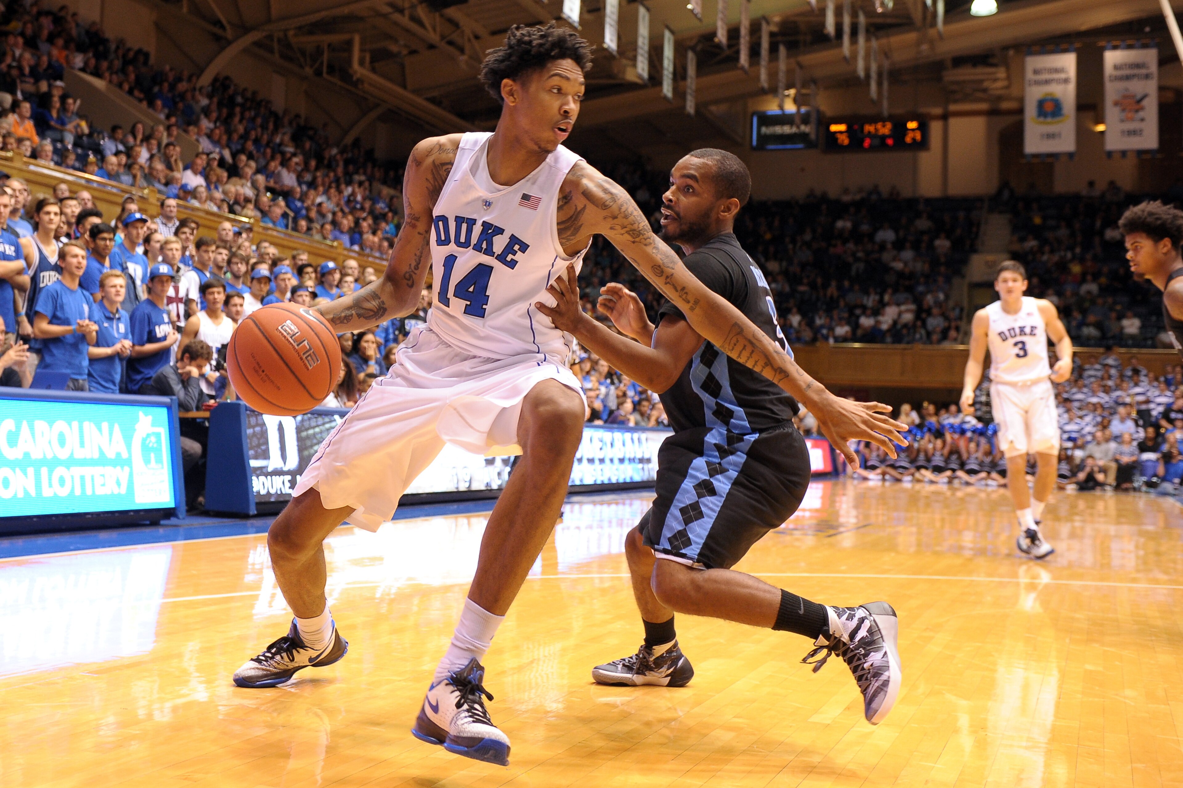 DURHAM, NC - NOVEMBER 04: Brandon Ingram #14 of the Duke Blue Devils drives against Daryl Traynham #3 of the Livingstone Blue Bears at Cameron Indoor Stadium on November 4, 2015 in Durham, North Carolina. Duke defeated Livingstone 119-54. (Photo by Lance