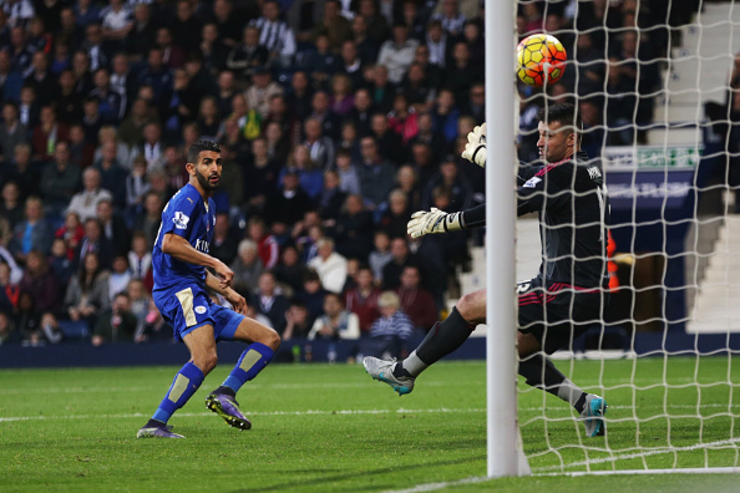 WEST BROMWICH, ENGLAND - OCTOBER 31: Riyad Mahrez of Leicester City scores his team's second goal during the Barclays Premier League match between West Bromwich Albion and Leicester City at The Hawthorns on October 31, 2015 in West Bromwich, England.  (Ph