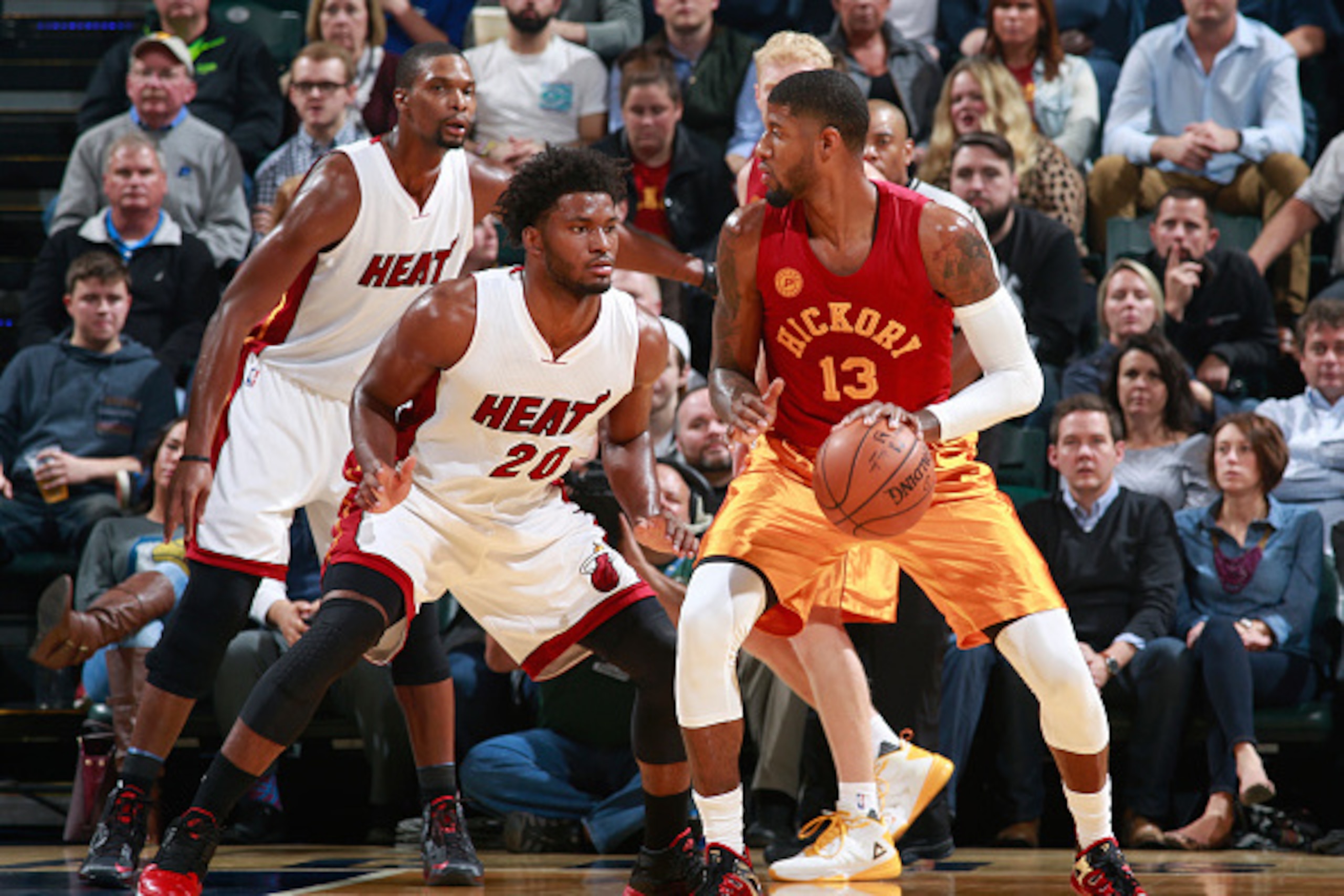 INDANAPOLIS, IN - NOVEMBER 6: Paul George #13 of the Indiana Pacers drives to the basket while guarded by Justise Winslow #20 of the Miami Heat at Bankers Life Fieldhouse on November 6, 2015 in Indianapolis, Indiana. NOTE TO USER: User expressly acknowle INDANAPOLIS, IN - NOVEMBER 6: Paul George #13 of the Indiana Pacers drives to the basket while guarded by Justise Winslow #20 of the Miami Heat at Bankers Life Fieldhouse on November 6, 2015 in Indianapolis, Indiana. NOTE TO USER: User expressly acknowle