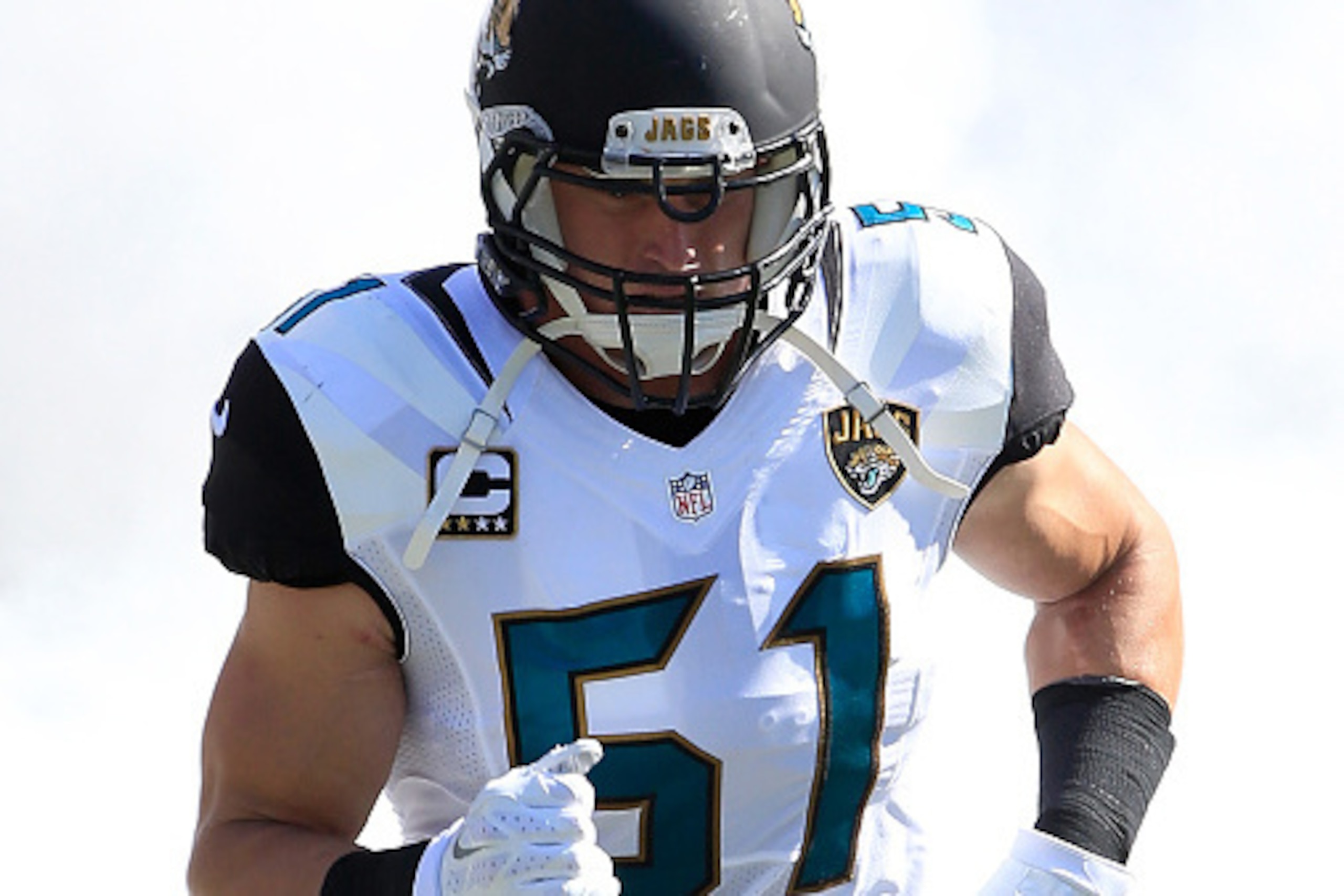 JACKSONVILLE, FL - SEPTEMBER 20:   Paul Posluszny #51 of the Jacksonville Jaguars enters the field before the game against the Miami Dolphins at EverBank Field on September 20, 2015 in Jacksonville, Florida.  (Photo by Sam Greenwood/Getty Images)