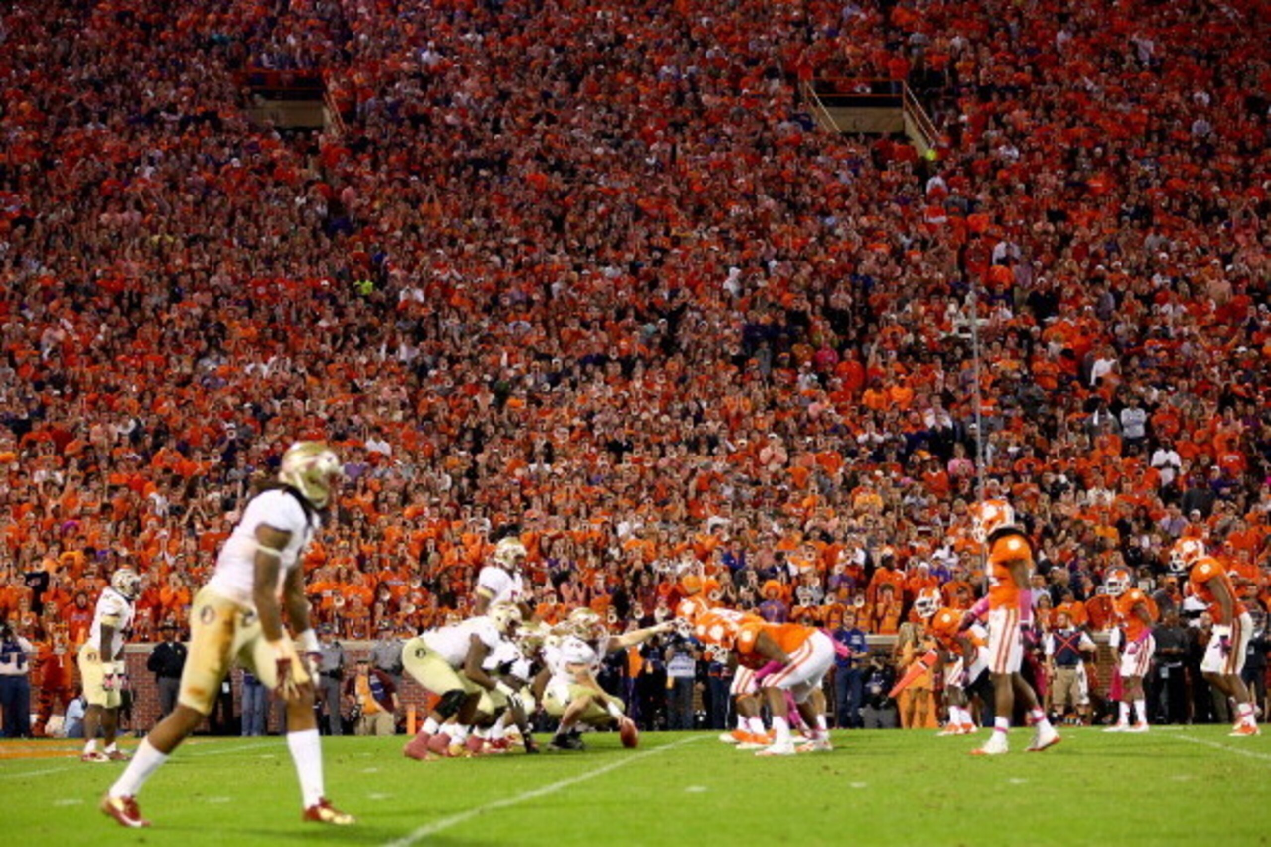 CLEMSON, SC - OCTOBER 19:  The crowd of the Clemson Tigers watches as they take on the Florida State Seminoles during their game at Memorial Stadium on October 19, 2013 in Clemson, South Carolina.  (Photo by Streeter Lecka/Getty Images)