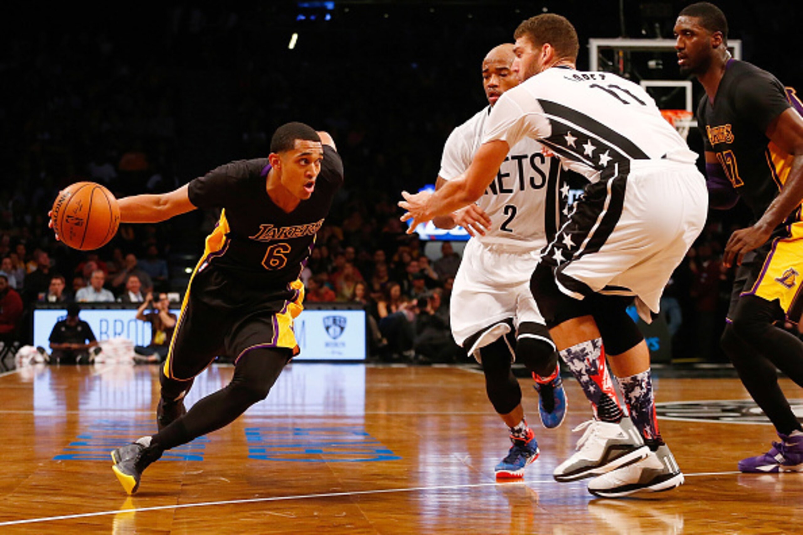 NEW YORK, NY - NOVEMBER 06: Jordan Clarkson #6 of the Los Angeles Lakers drives to the basket against Brook Lopez #11 of the Brooklyn Nets at the Barclays Center on November 6, 2015 in the Brooklyn borough of New York City. The Lakers defeated the Nets 1 NEW YORK, NY - NOVEMBER 06: Jordan Clarkson #6 of the Los Angeles Lakers drives to the basket against Brook Lopez #11 of the Brooklyn Nets at the Barclays Center on November 6, 2015 in the Brooklyn borough of New York City. The Lakers defeated the Nets 1